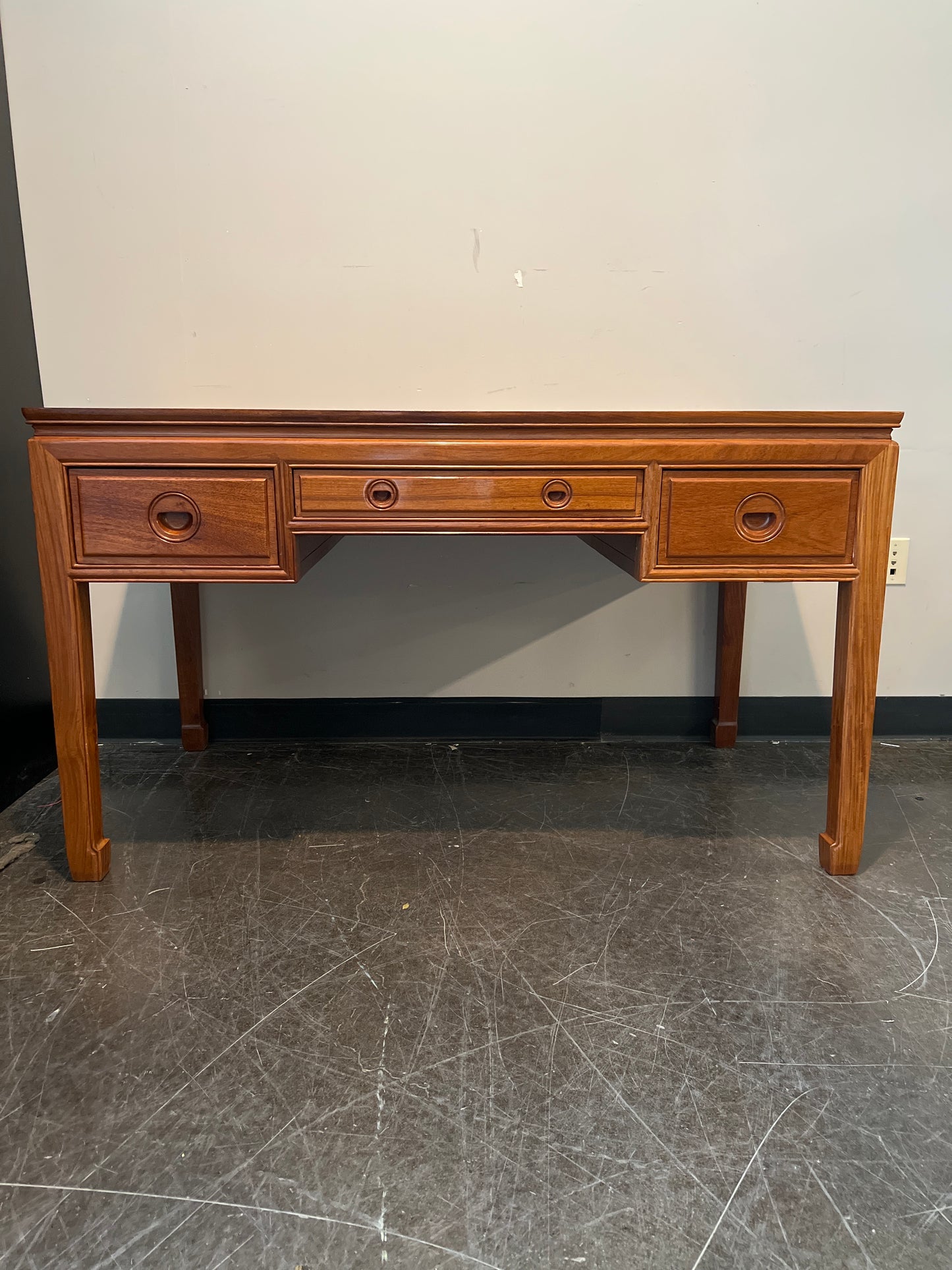 Richly-Toned Wood Writing Desk with Three Drawers