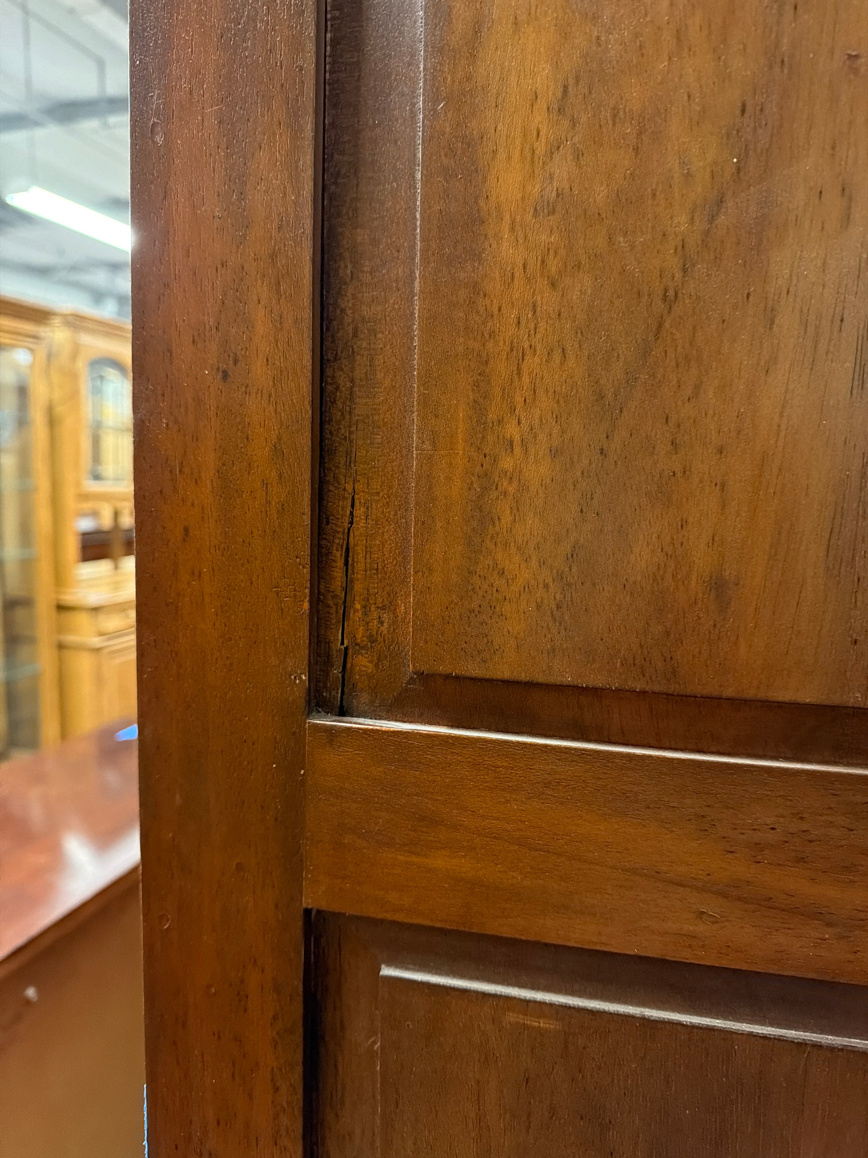 Stately Dark Wood Paneled Armoire with Drawer