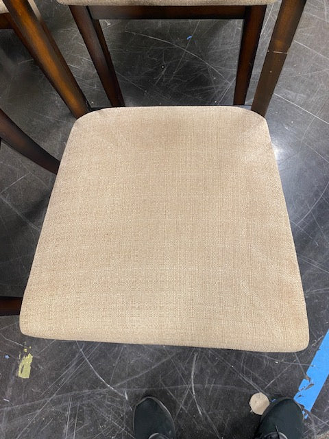 Set of Four Brown Wood Dining Chairs with Beige Cushions