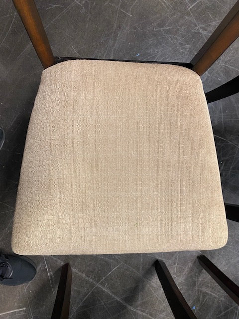 Set of Four Brown Wood Dining Chairs with Beige Cushions