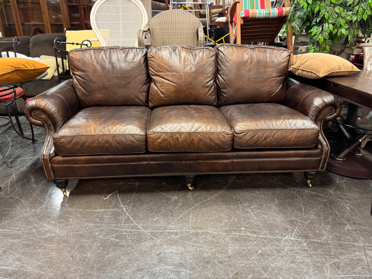 Brown Embossed Leather Couch On Casters