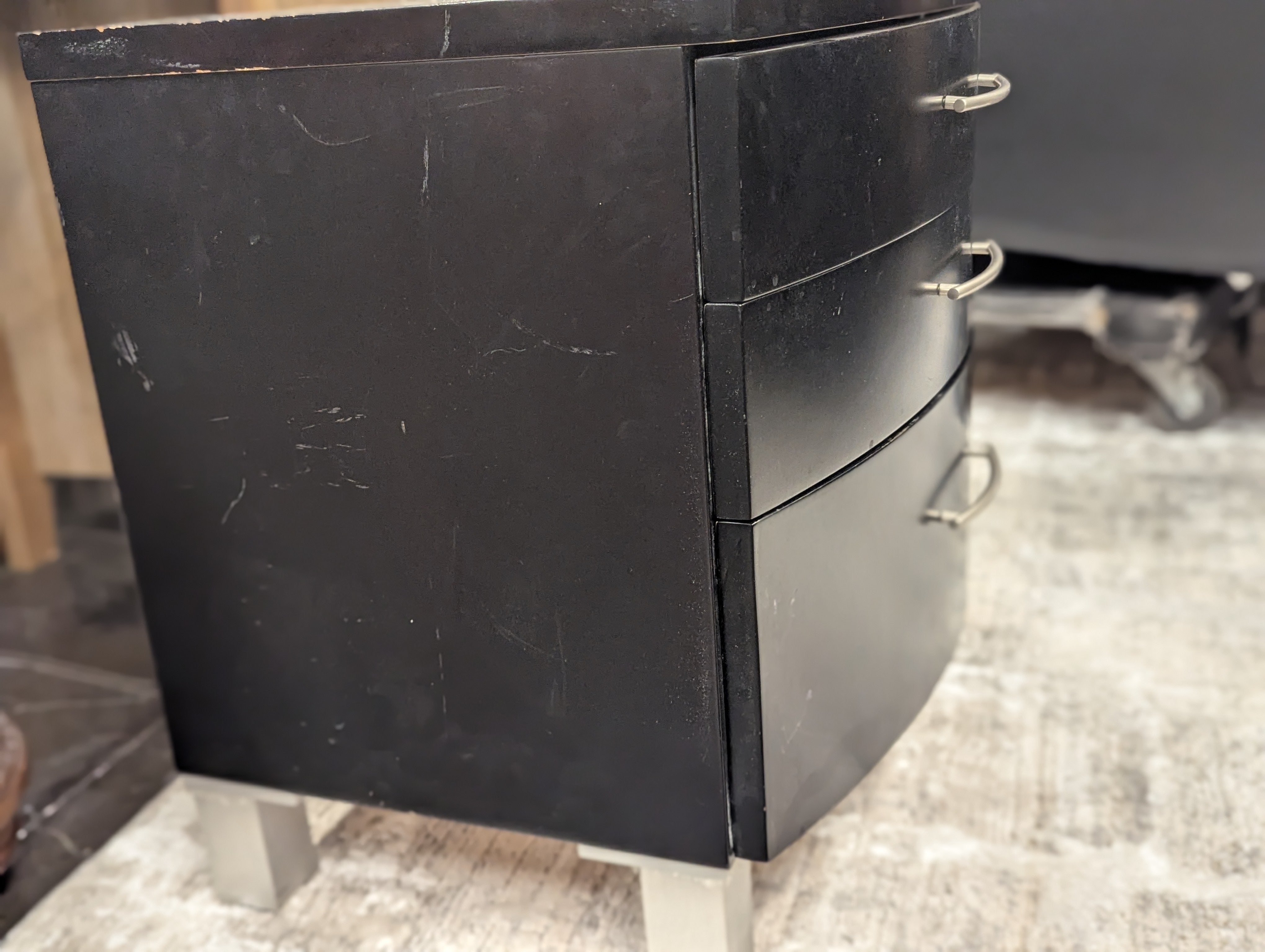 Curved Ebony Nightstand With SIlver Pulls
