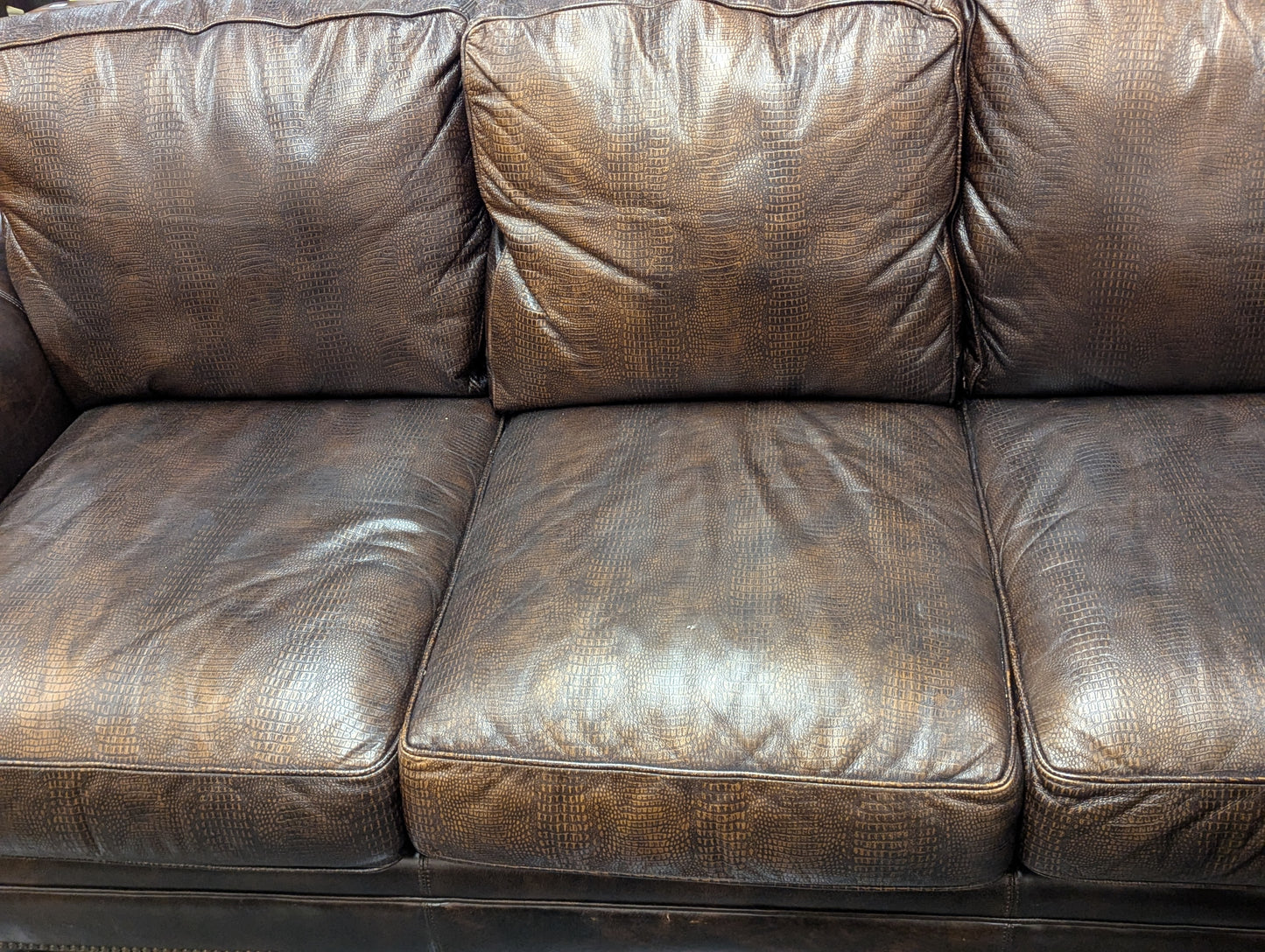 Brown Embossed Leather Couch On Casters