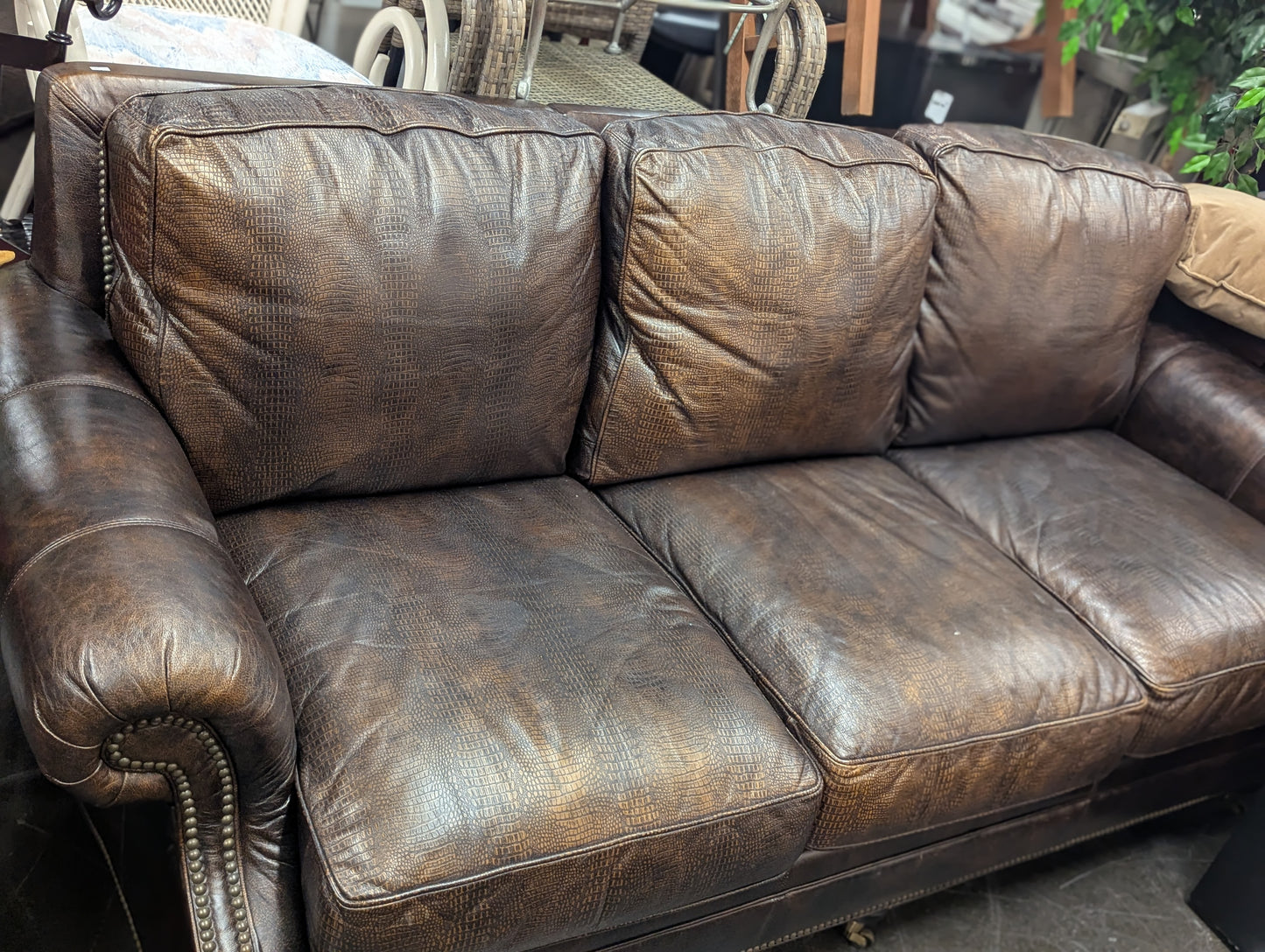 Brown Embossed Leather Couch On Casters