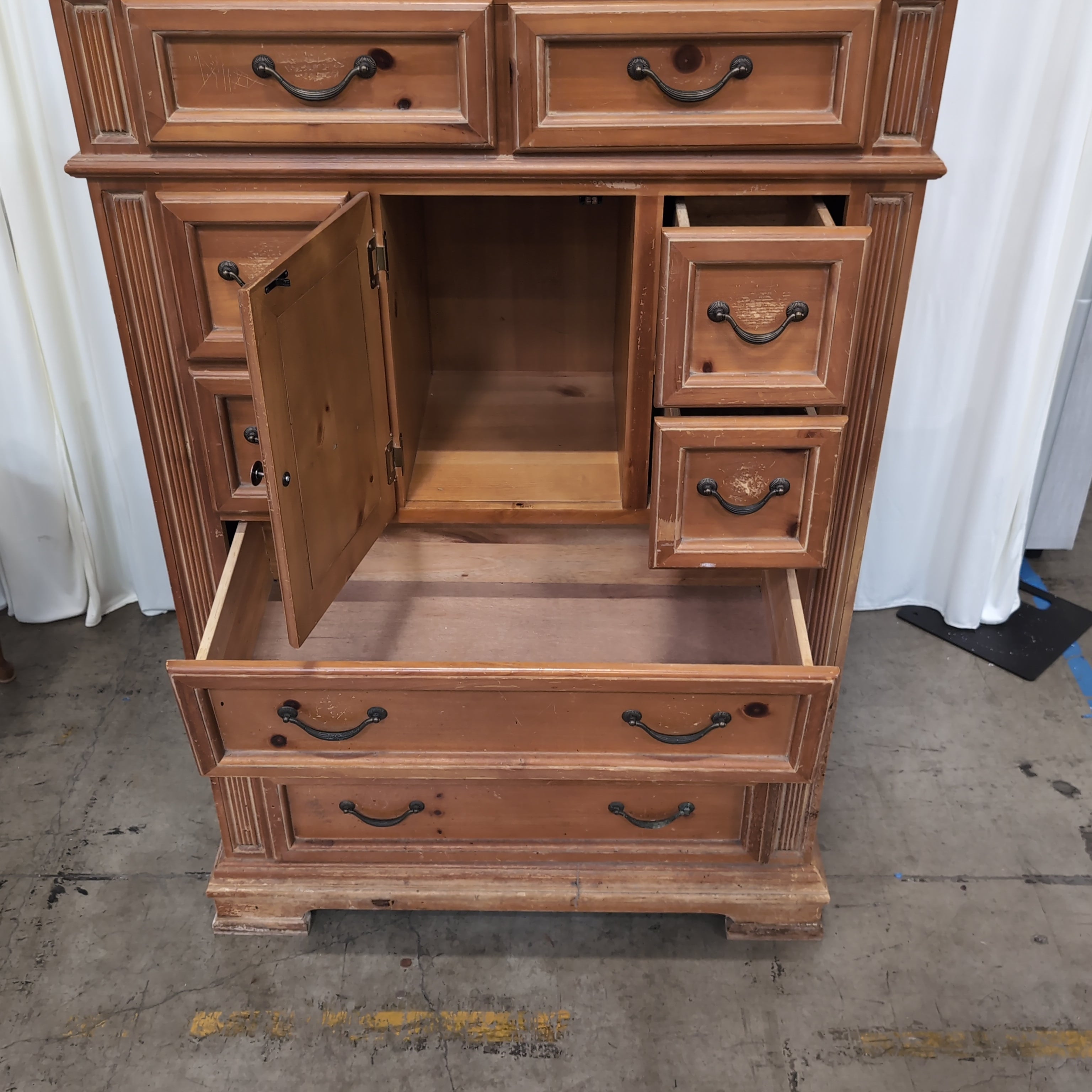 Traditional Carved Wood Dresser with Decorative Panel