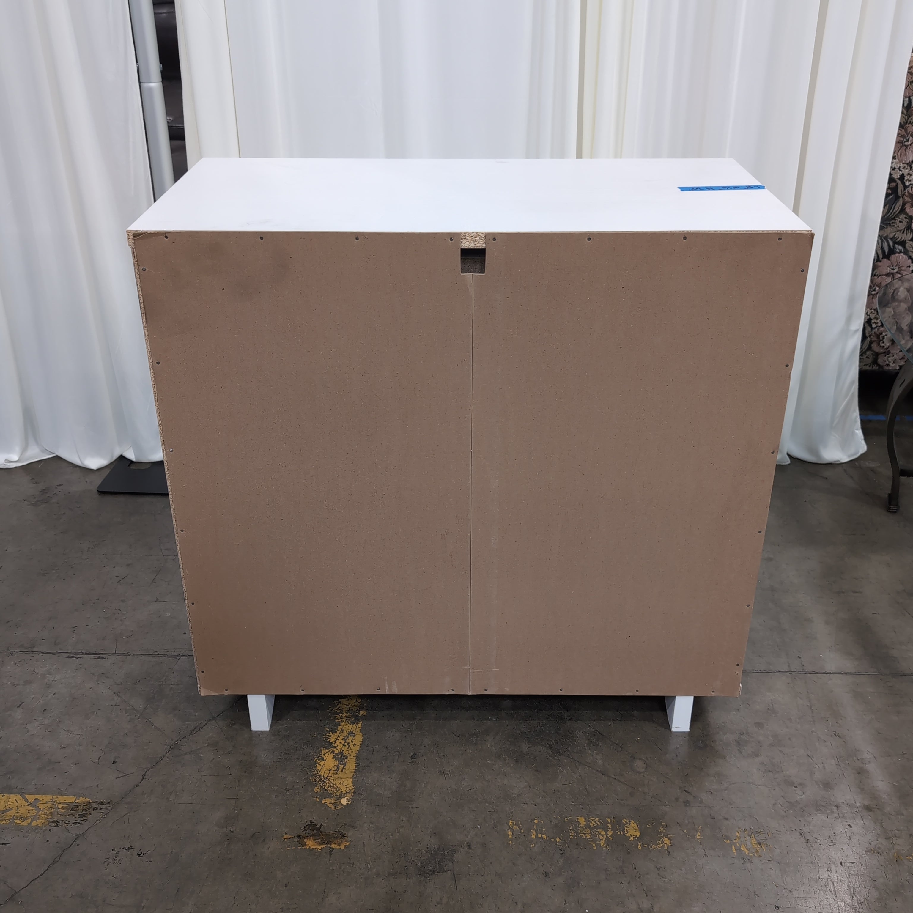 White Three-Drawer Dresser in Wood Finish