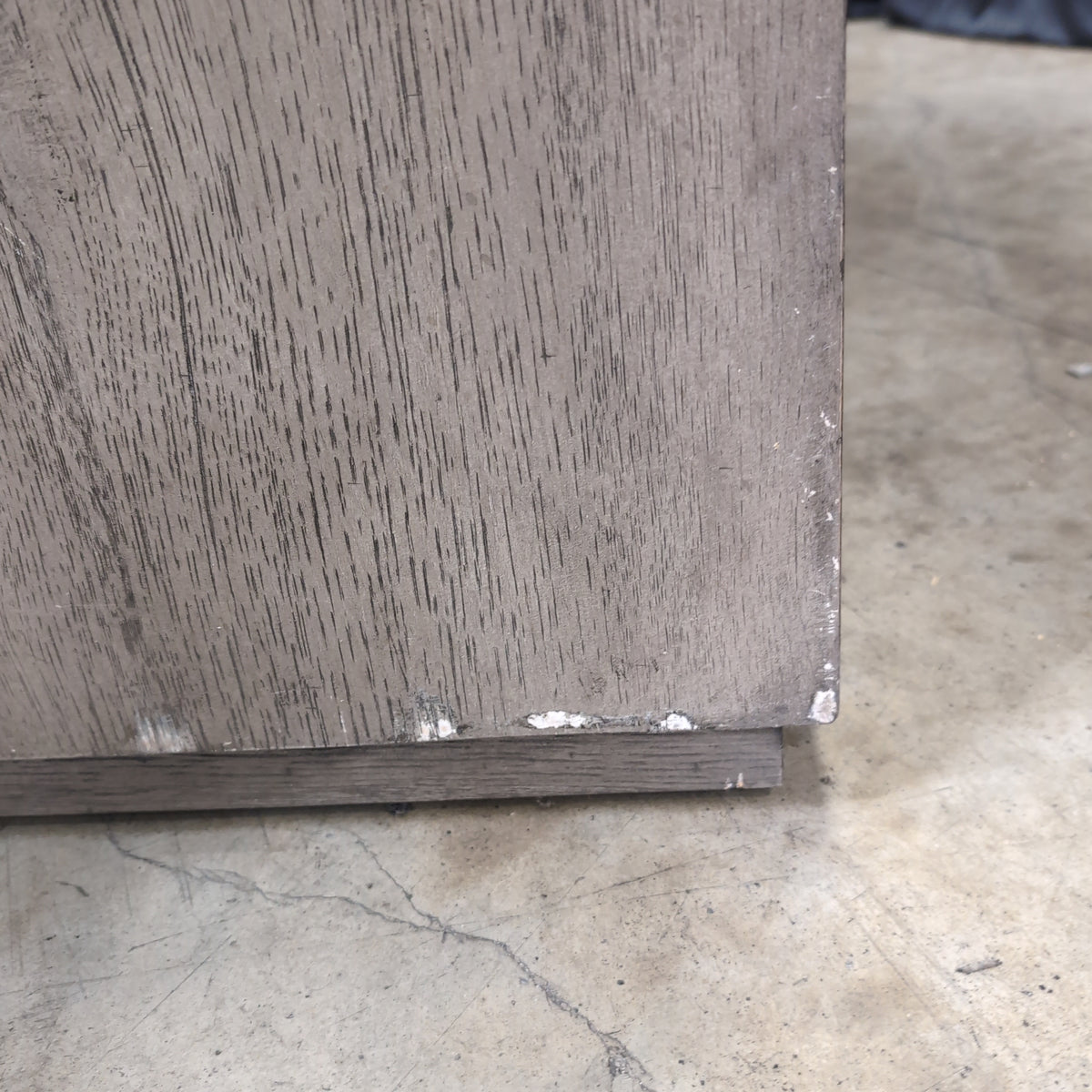 Light Wood Two-Drawer Nightstand with Textured Hardware