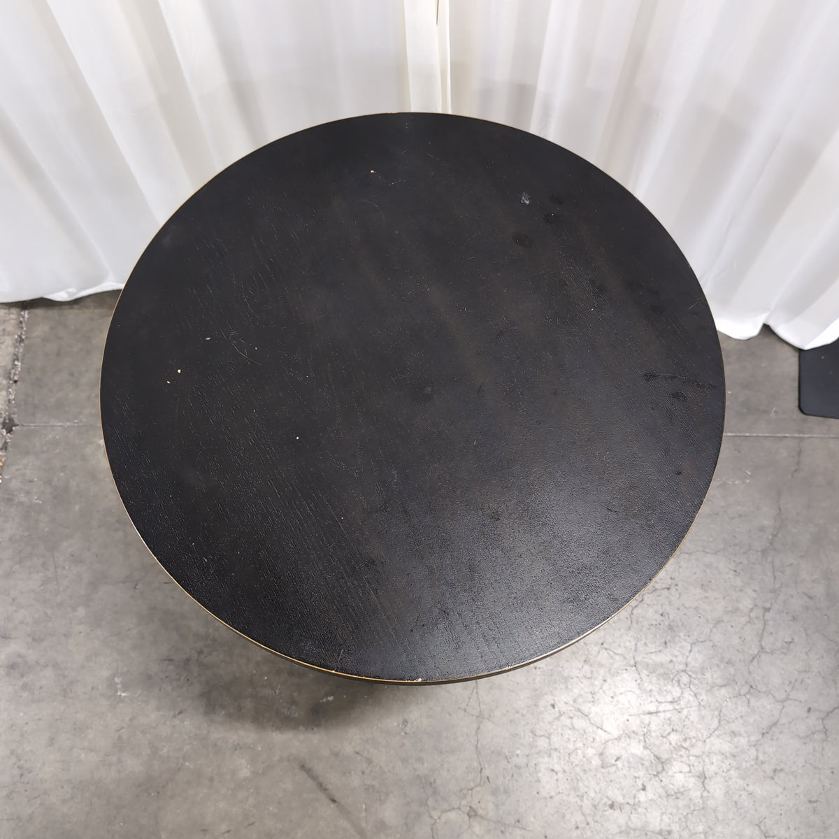 Round Dark Wood End Table with Ornate Metal Base