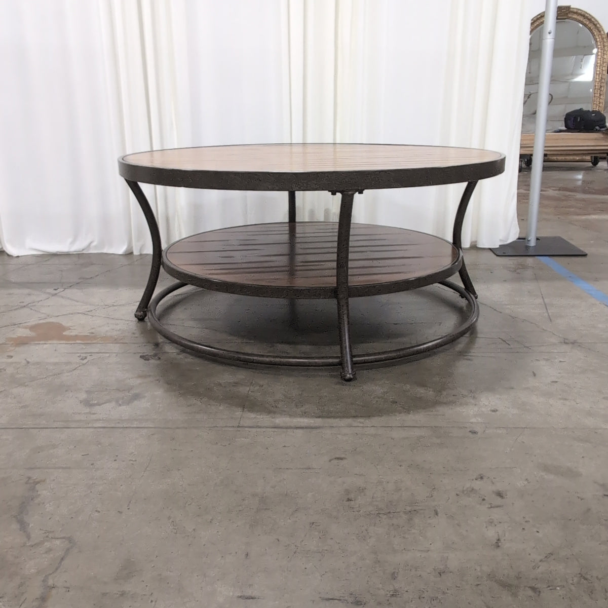 Ashley Furniture Two-Tier Round Wood Coffee Table with Metal Frame