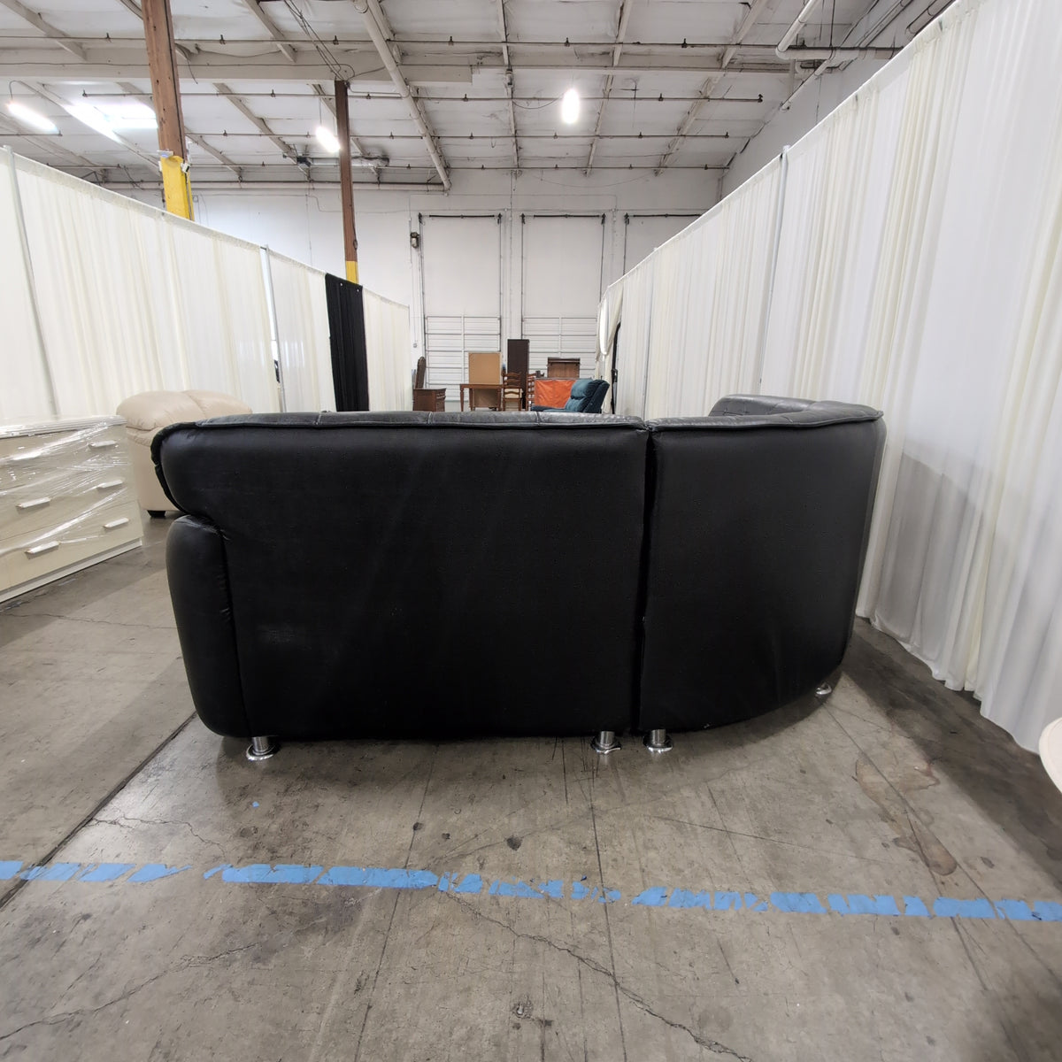 Black Tufted Leather Sectional Couch with Chrome Feet