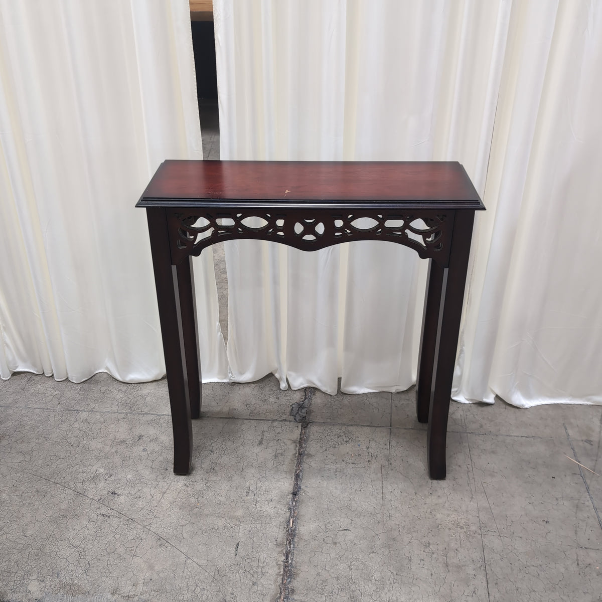 Dark Stained Wood Console Table with Ornate Details
