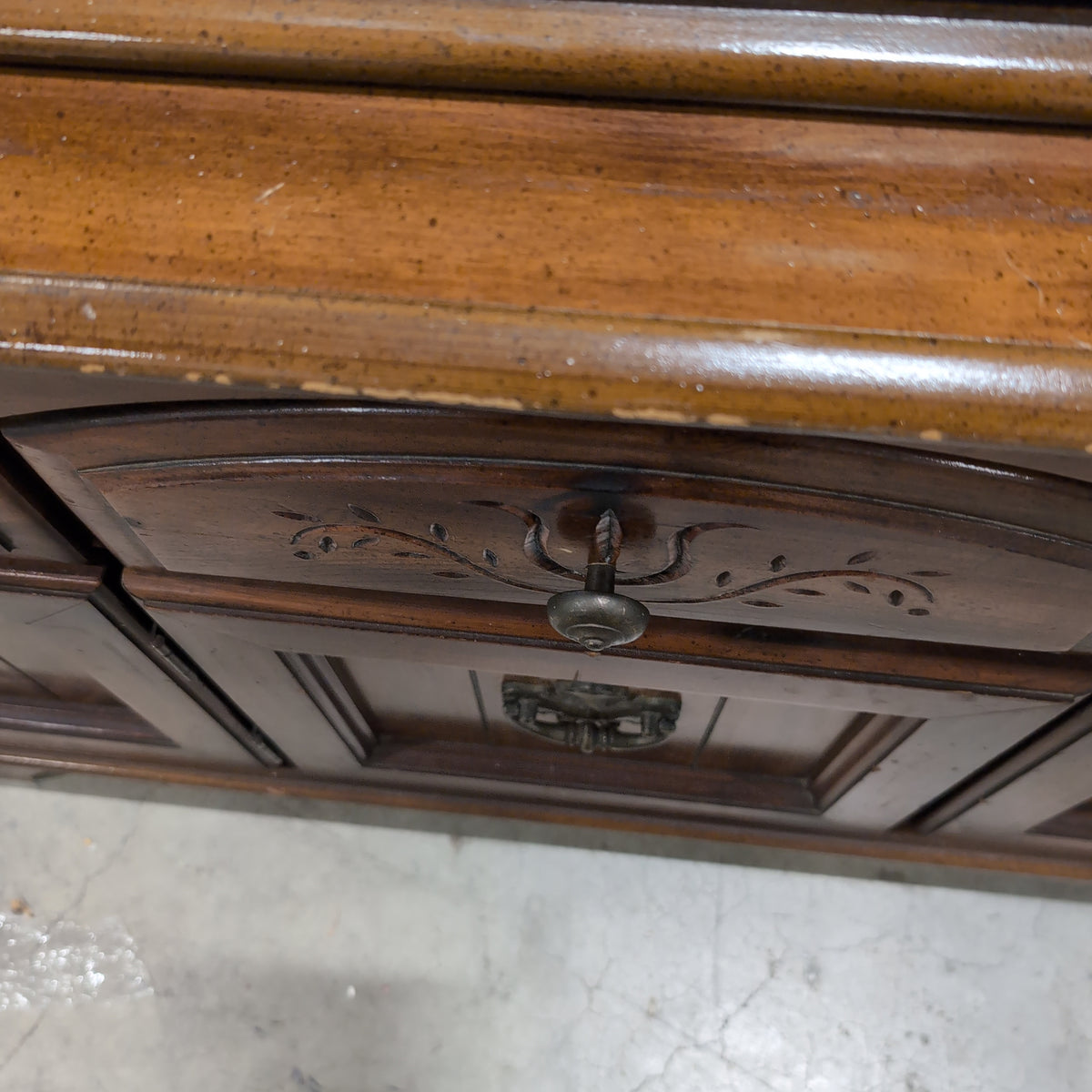 Brown Wood China Cabinet with Ornate Carvings