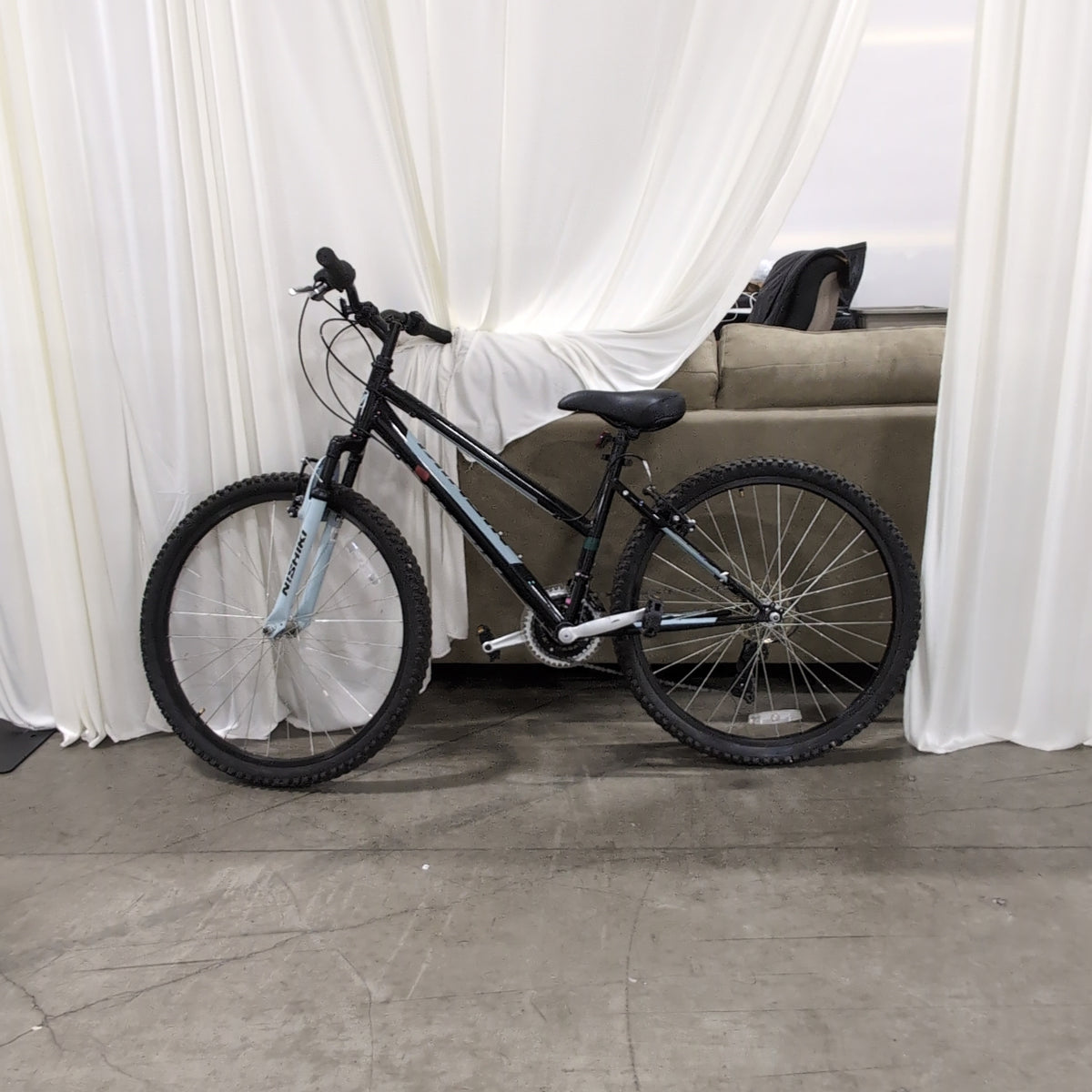 Black Nishiki Pueblo Mountain Bicycle with Front Suspension