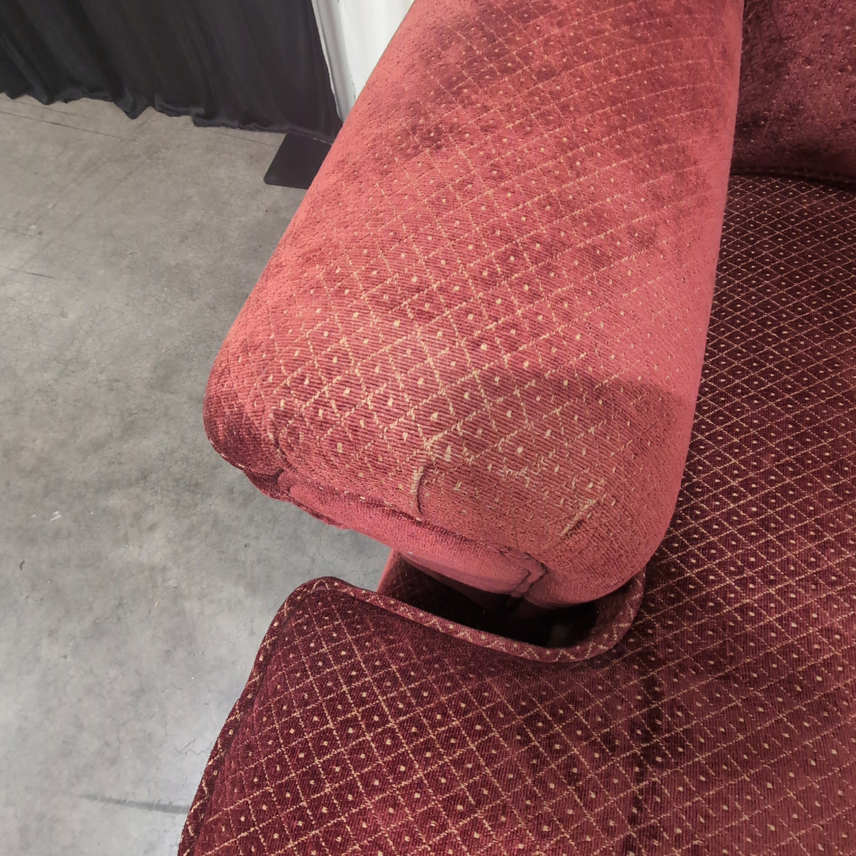 Deep Red Upholstered Three-Seat Couch
