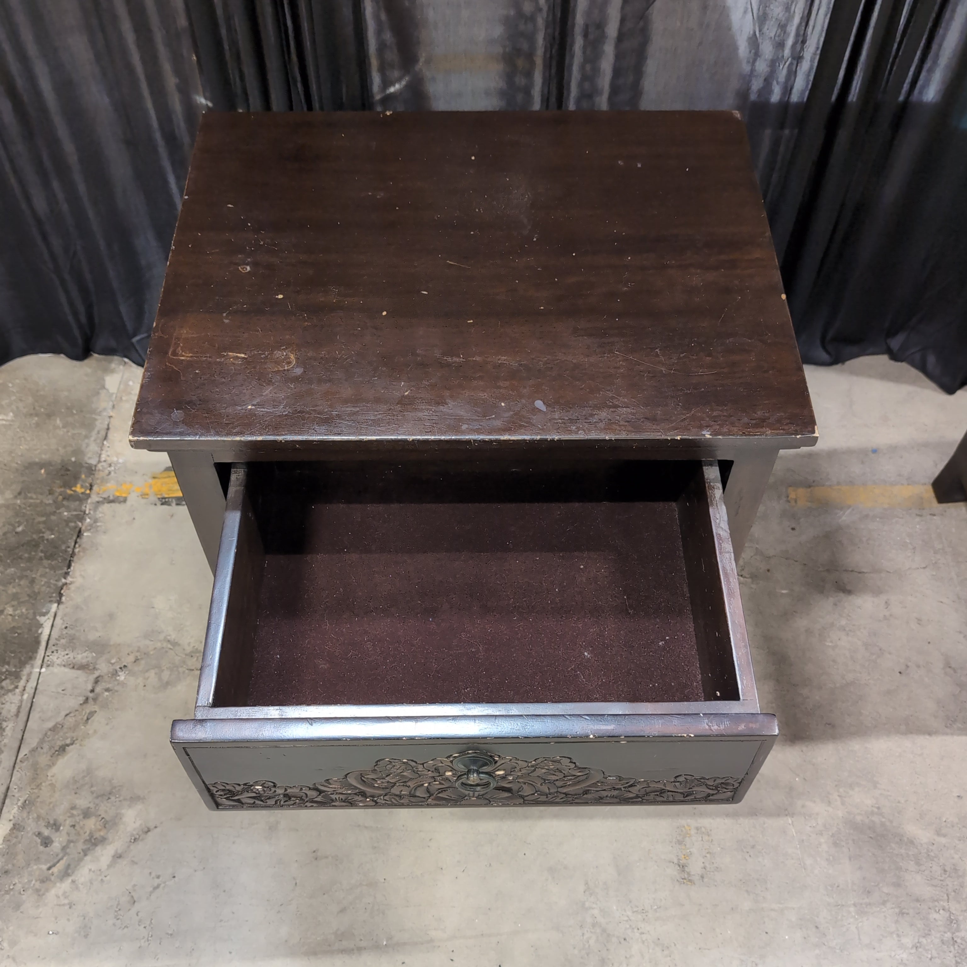 Dark Wood Nightstand with Carved Drawer Front