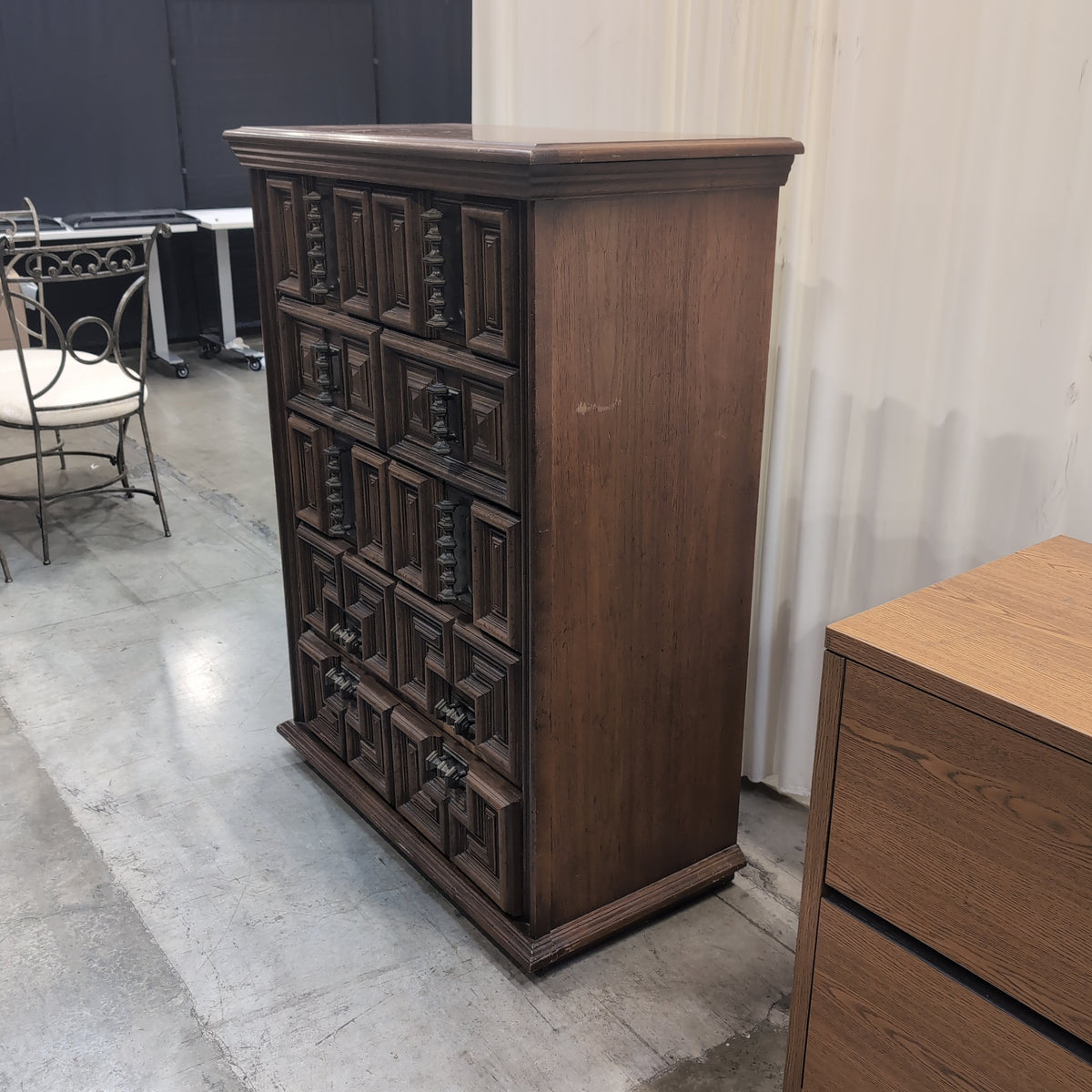 Dark Wood Carved Geometric Dresser with Ornate Hardware
