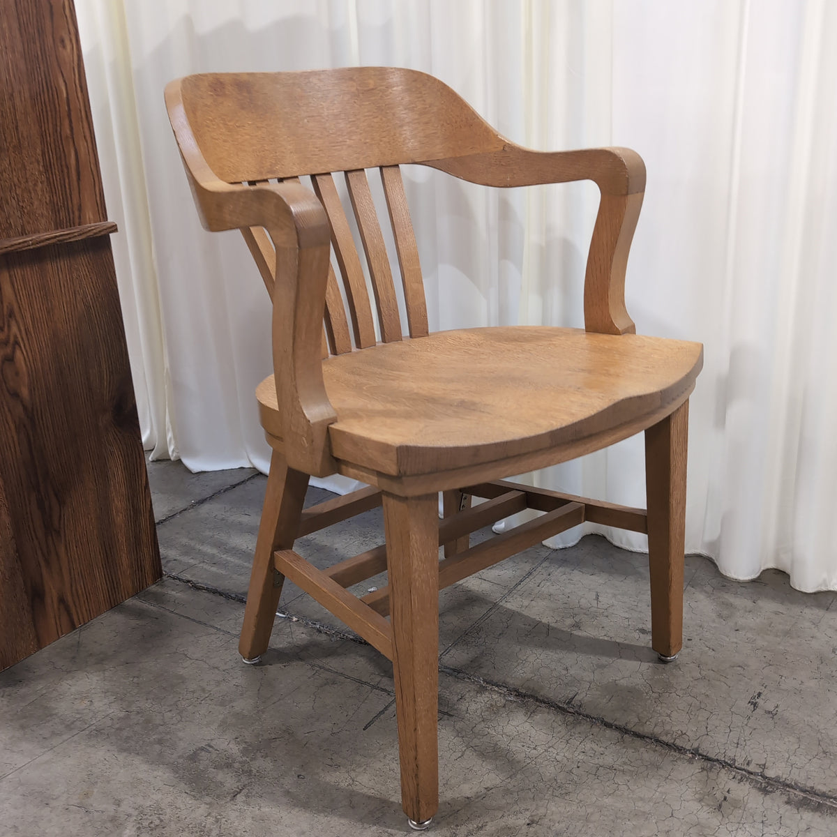 Golden Oak Curved Back Arm Chair with Slatted Spindles