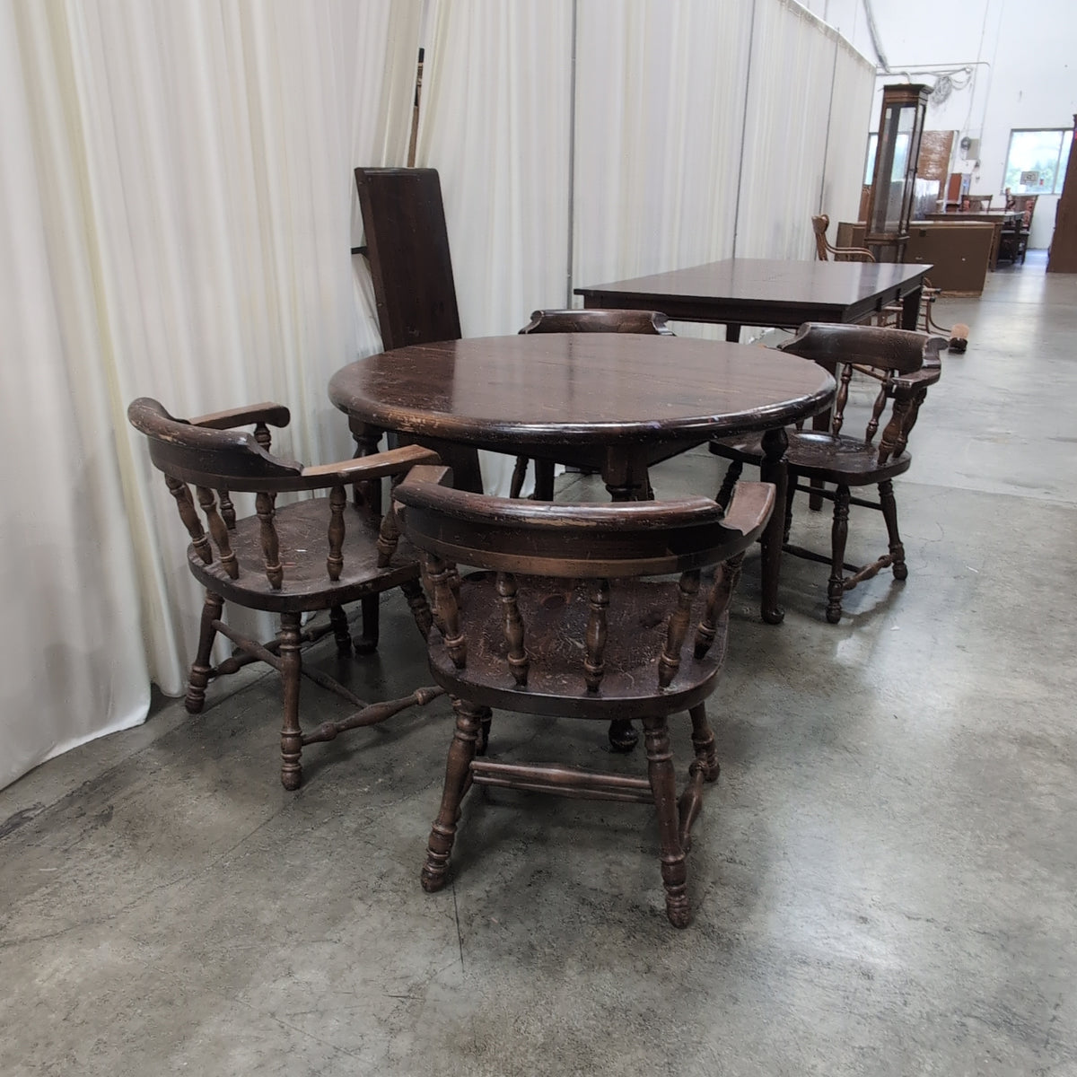 Dark Wood Round Dining Table with Spindle Chairs