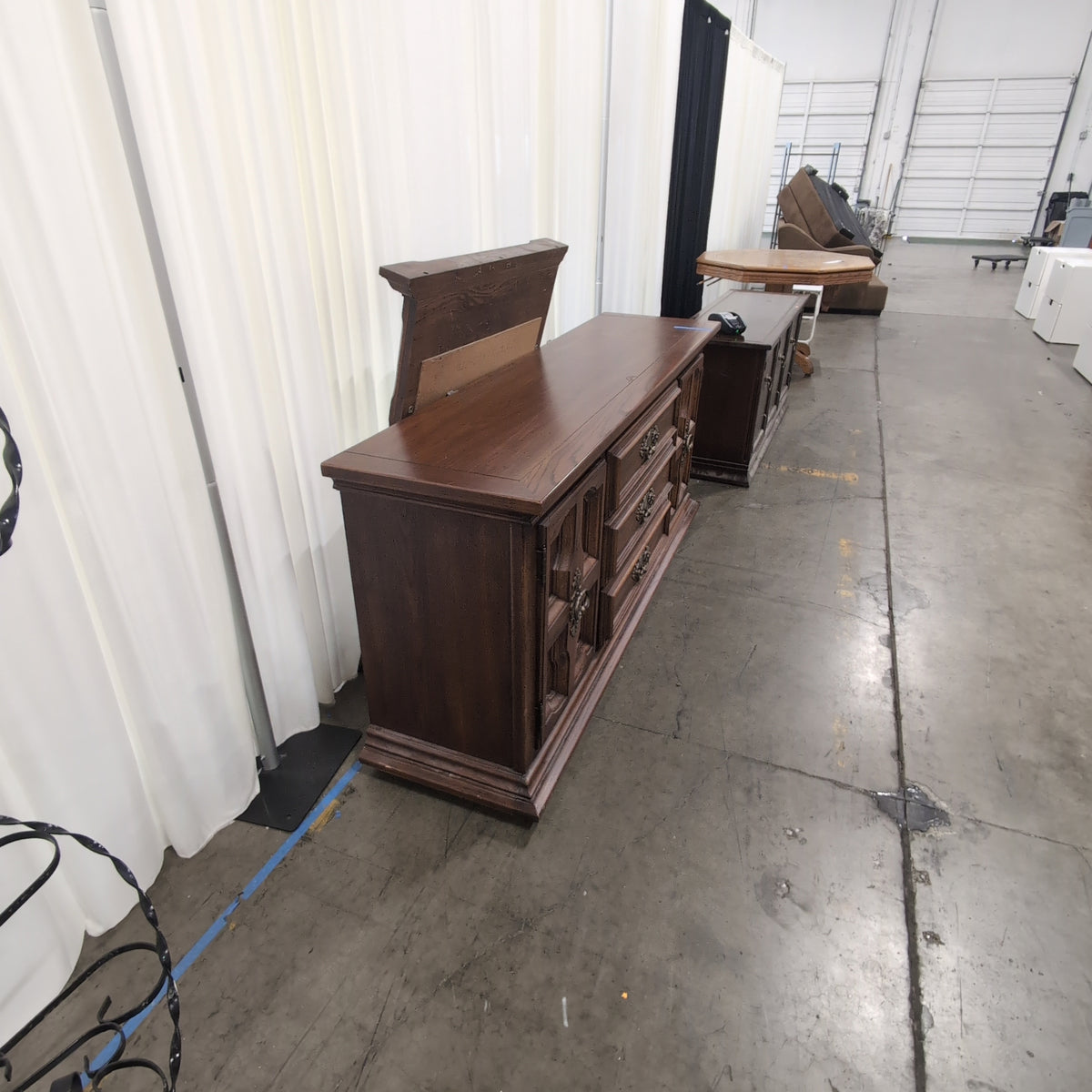 Traditional Dark Wood Buffet with Ornate Hardware