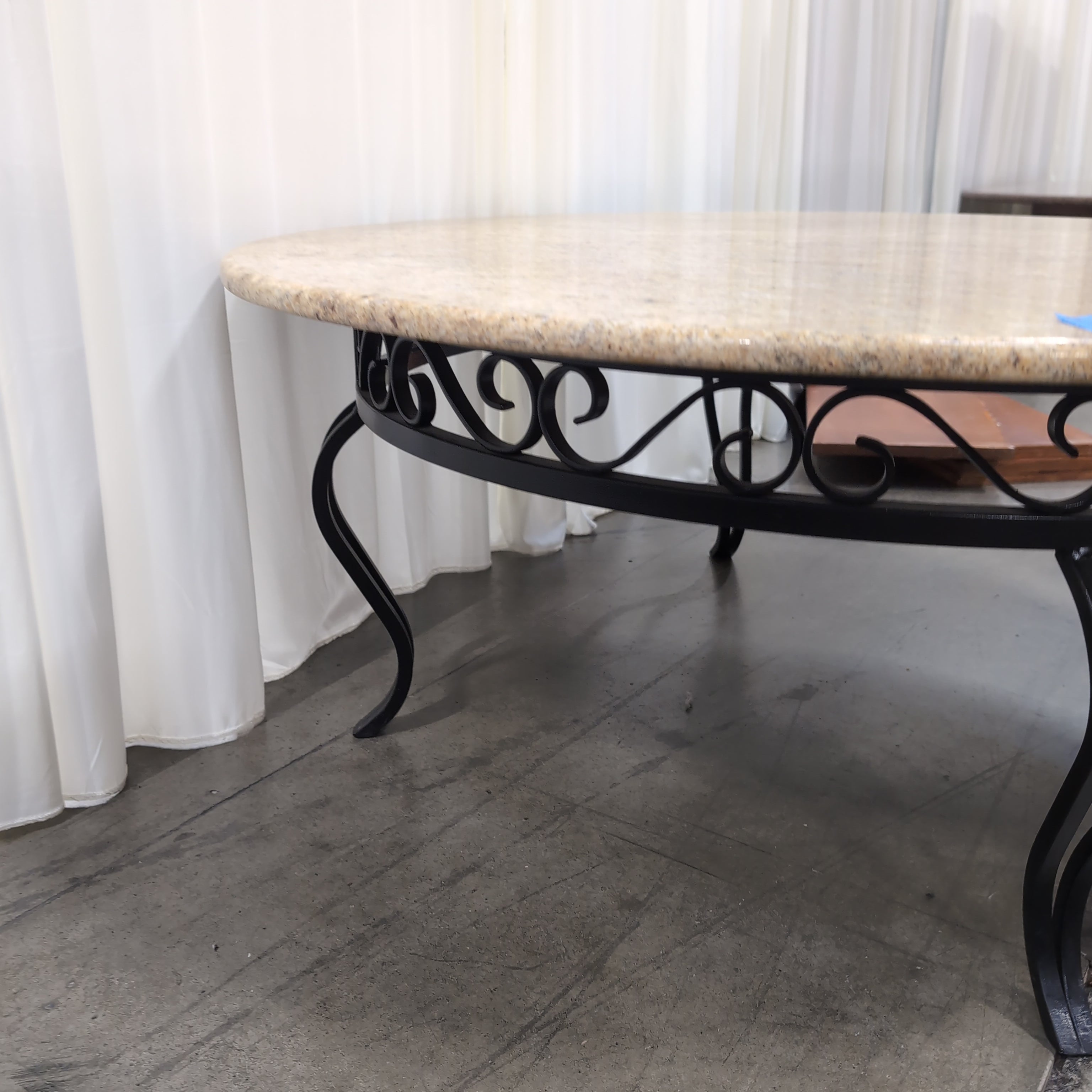 Oval Pink Speckled Granite Coffee Table with Wood Base