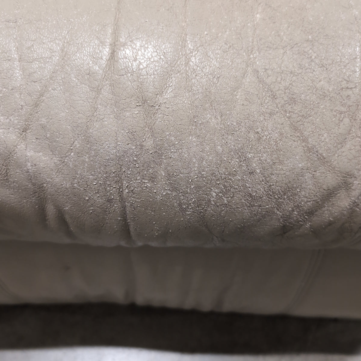 Overstuffed Light Beige Recliner in Leather