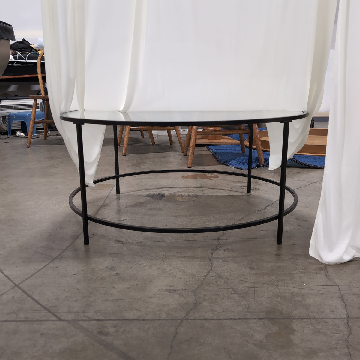 Round Glass Coffee Table with Black Metal Frame