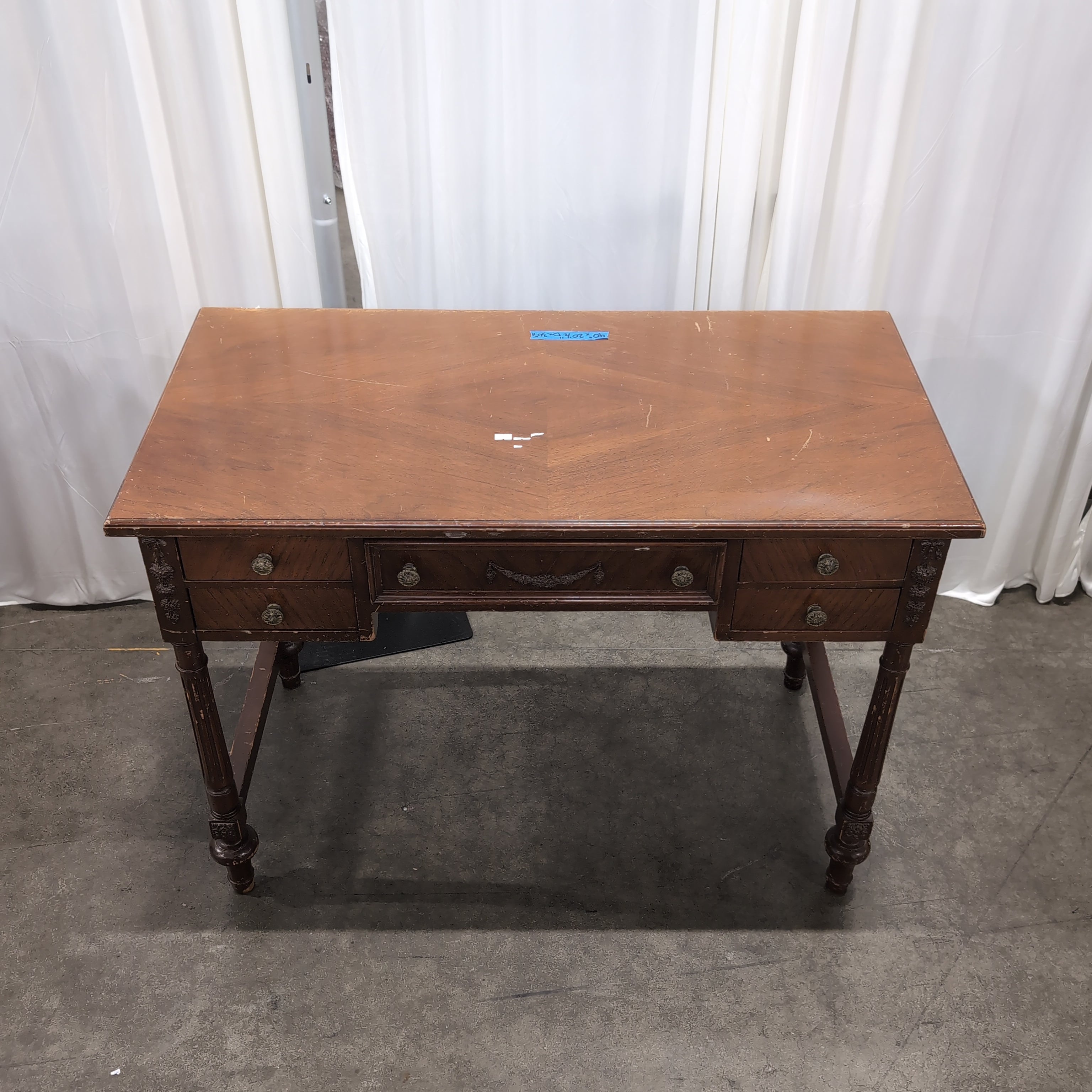 Traditional Reddish-Brown Wood Desk with Ornate Legs