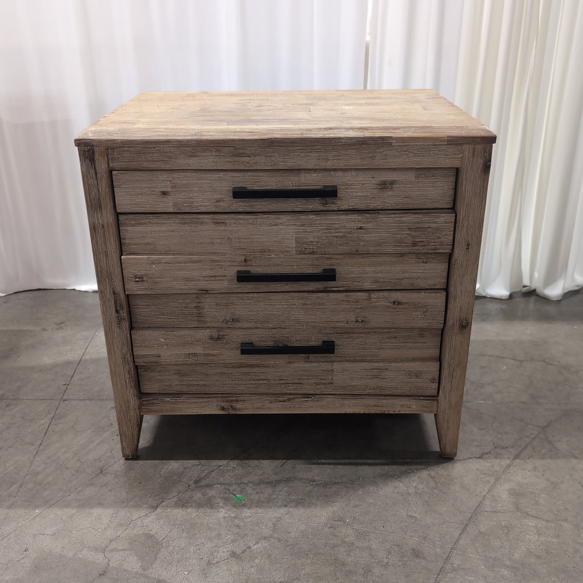 Distressed Light Wood Three-Drawer Nightstand