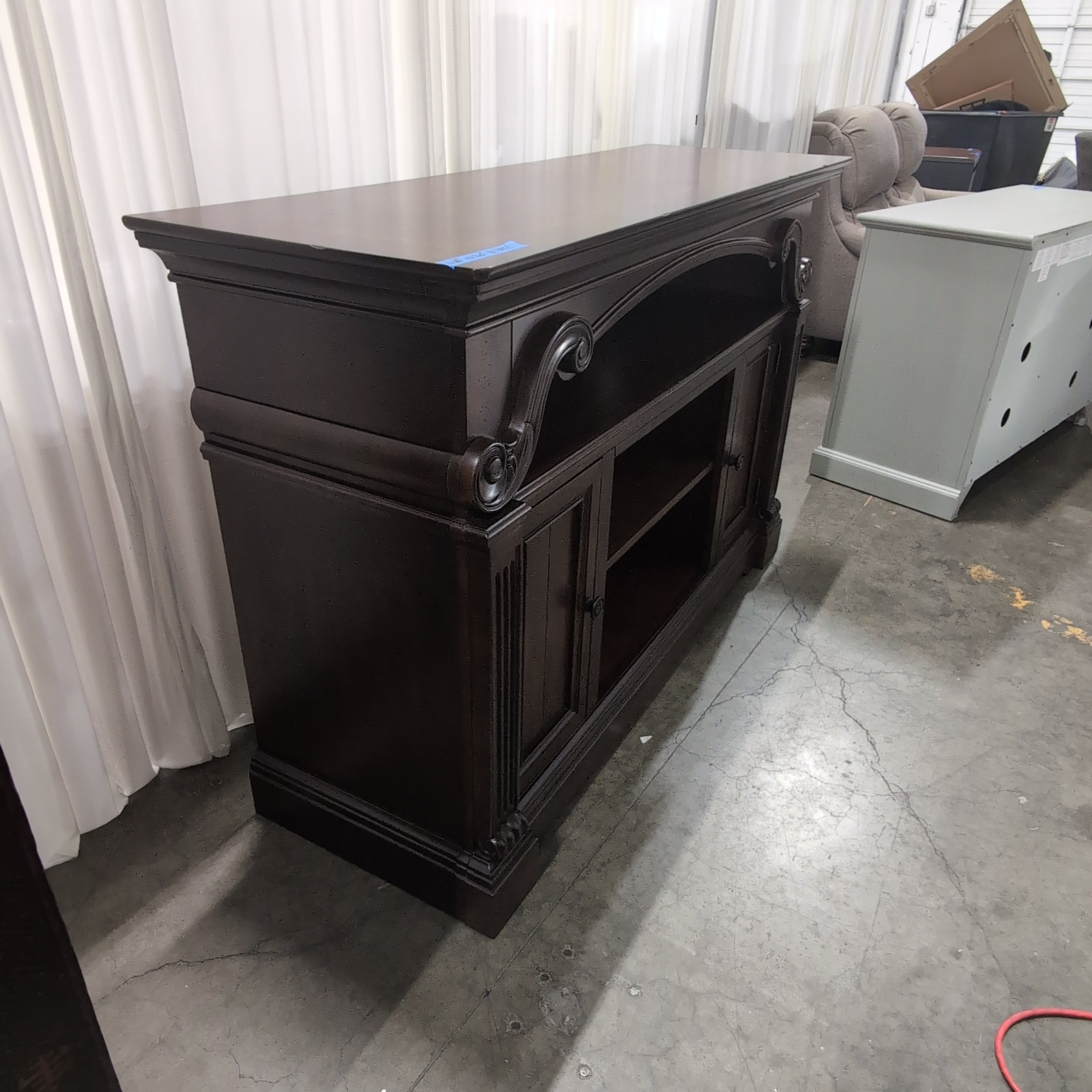Dark Wood Traditional Style TV Stand with Ornate Carvings