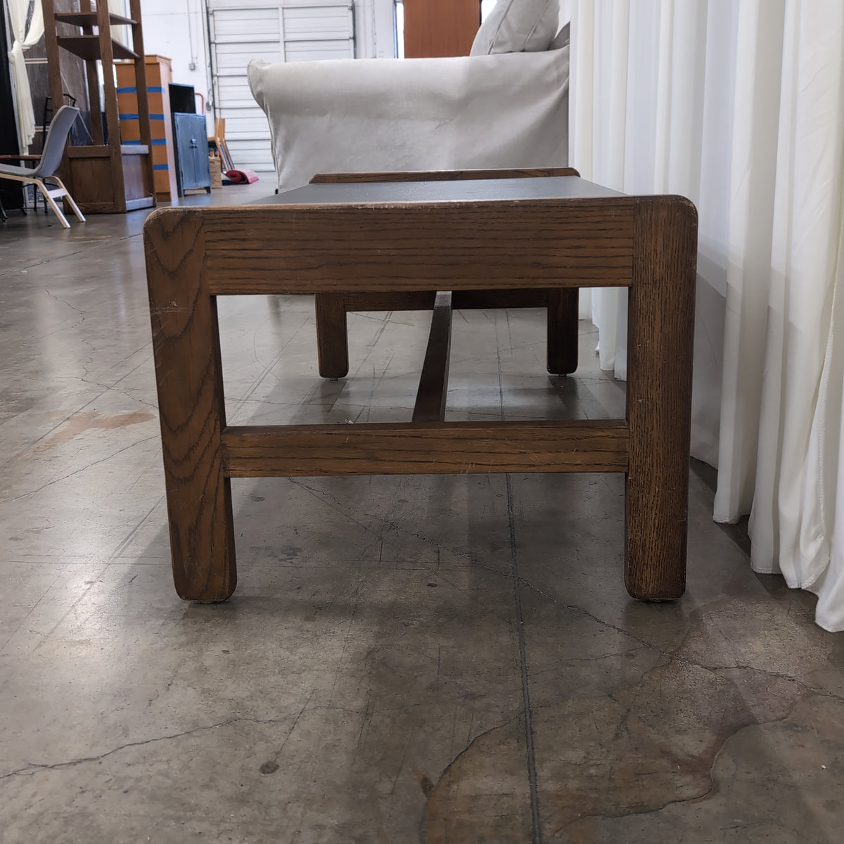 Brown Wood Console Table with Black Side Panel