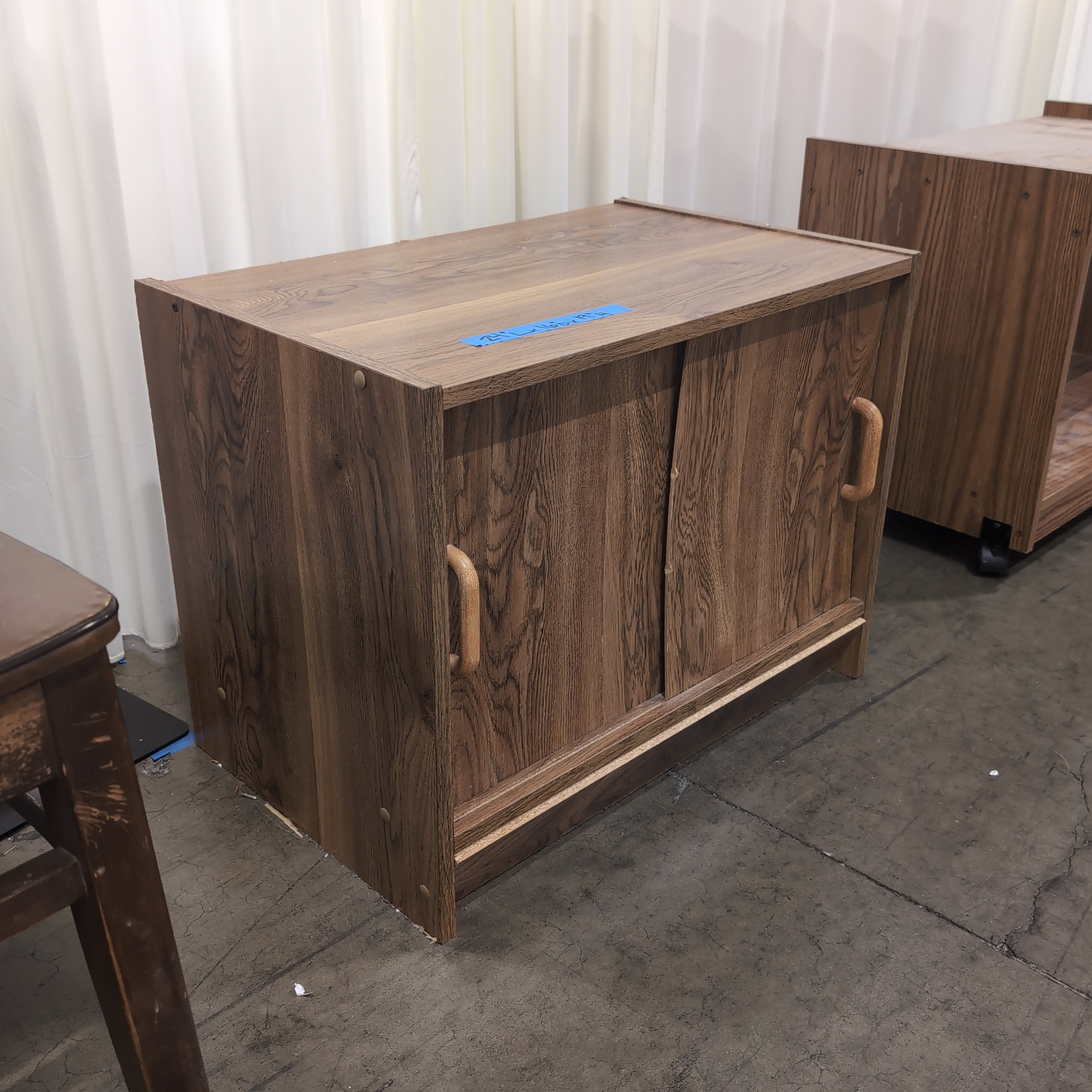 Brown Wood Two-Door TV Stand