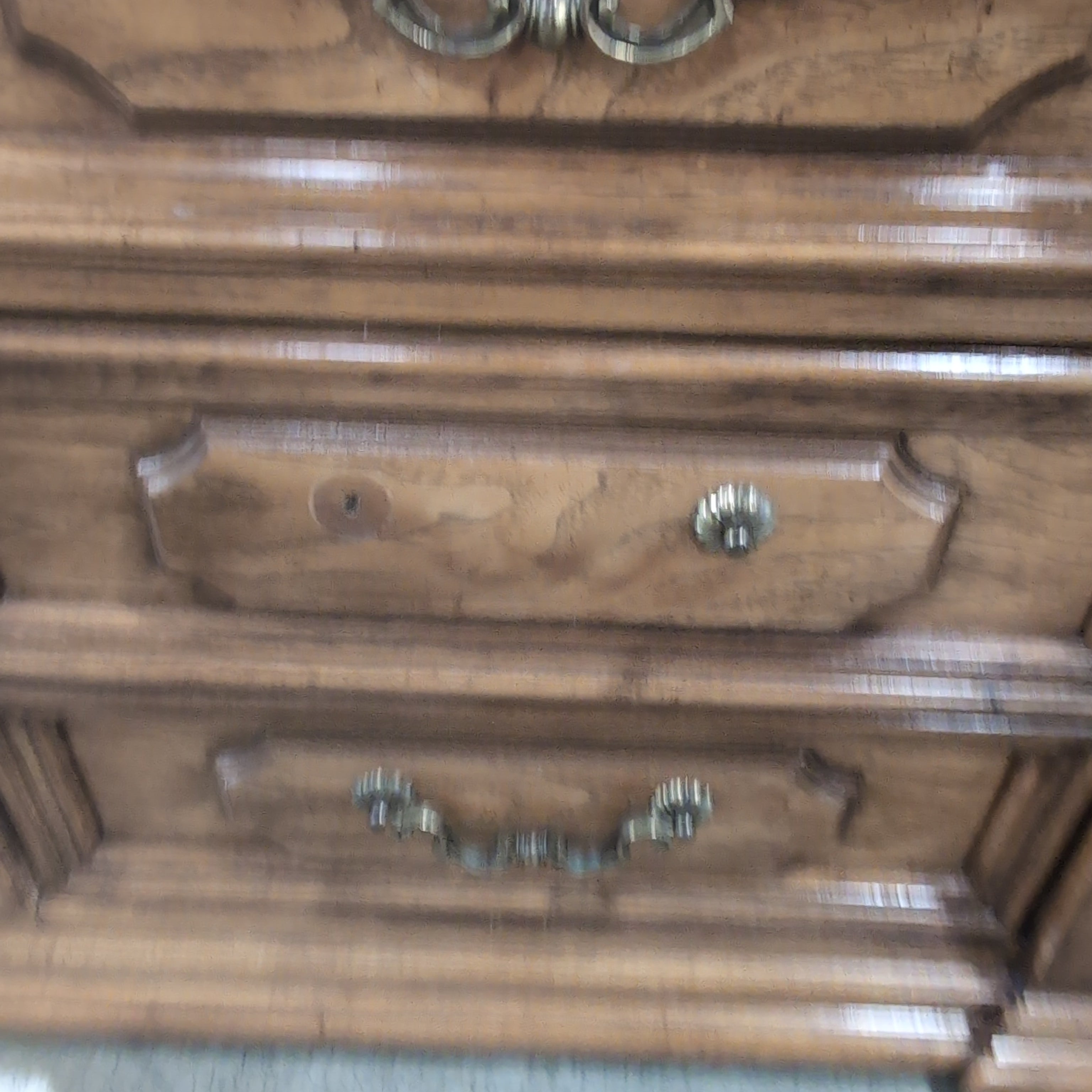 Traditional Brown Wood Dresser with Ornate Hardware