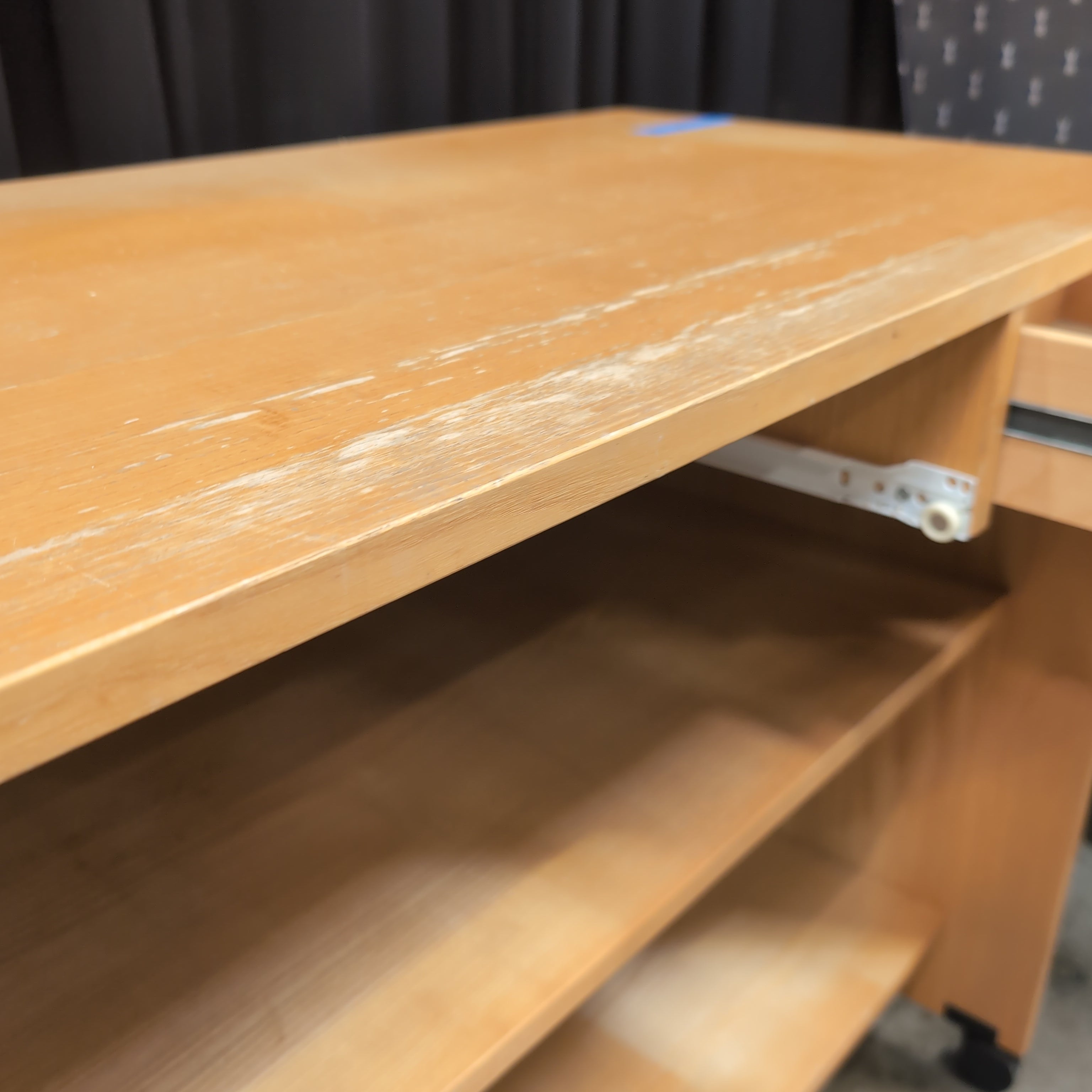 Light Wood Three-Shelf Bookcase with Casters
