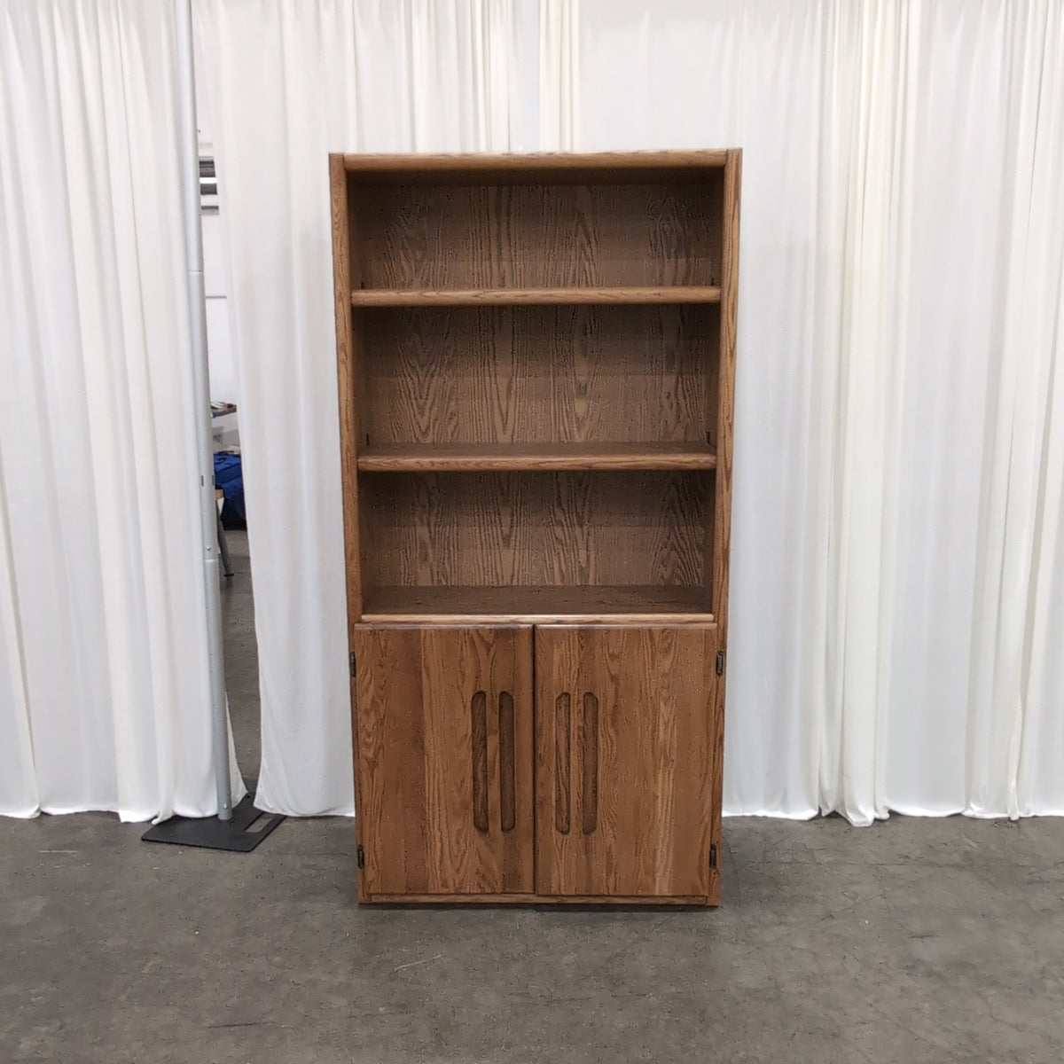 Traditional Medium Brown Wood Bookcase with Cabinet Base