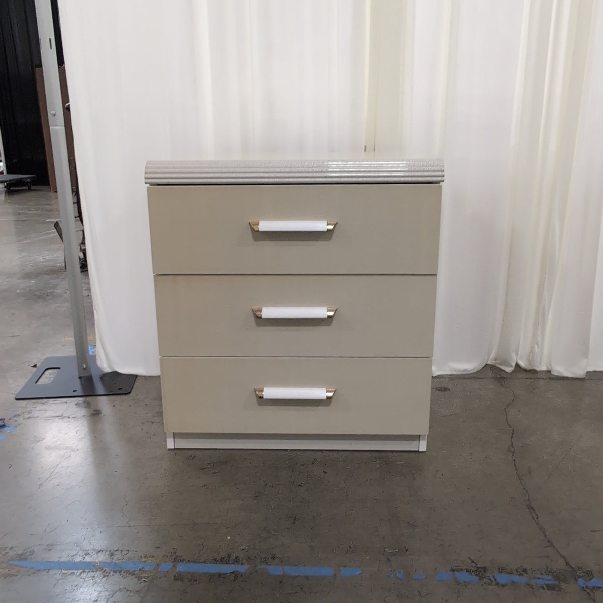 Light Beige Glossy Three-Drawer Nightstand with Ribbed Top