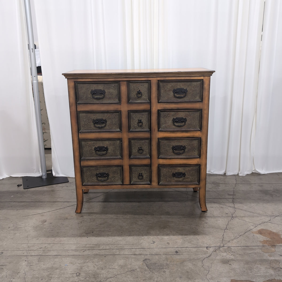 Warm Brown Wood Multi-Drawer Dresser with Ornate Pulls