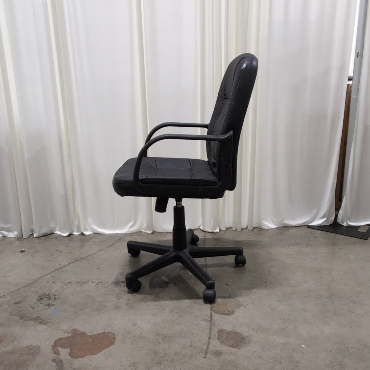 Black Tufted Executive Office Chair in Faux Leather