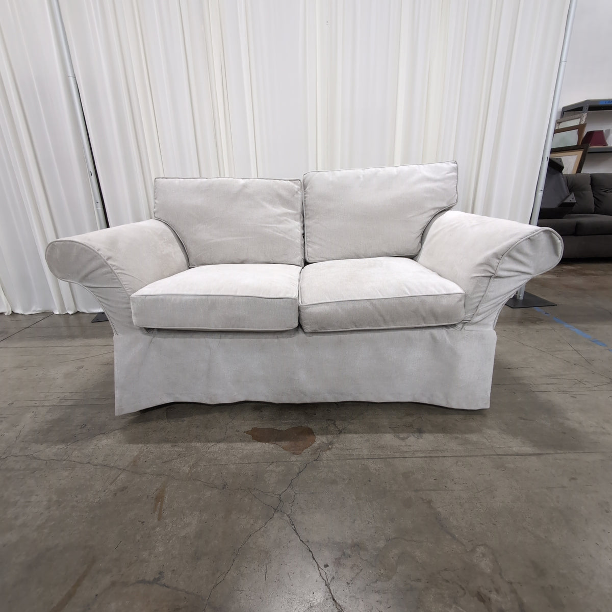 Light Grey Fabric Rolled Arm Loveseat with Skirted Base