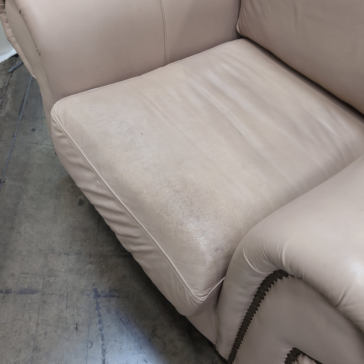 Padded Tan Armchair with Rolled Arms