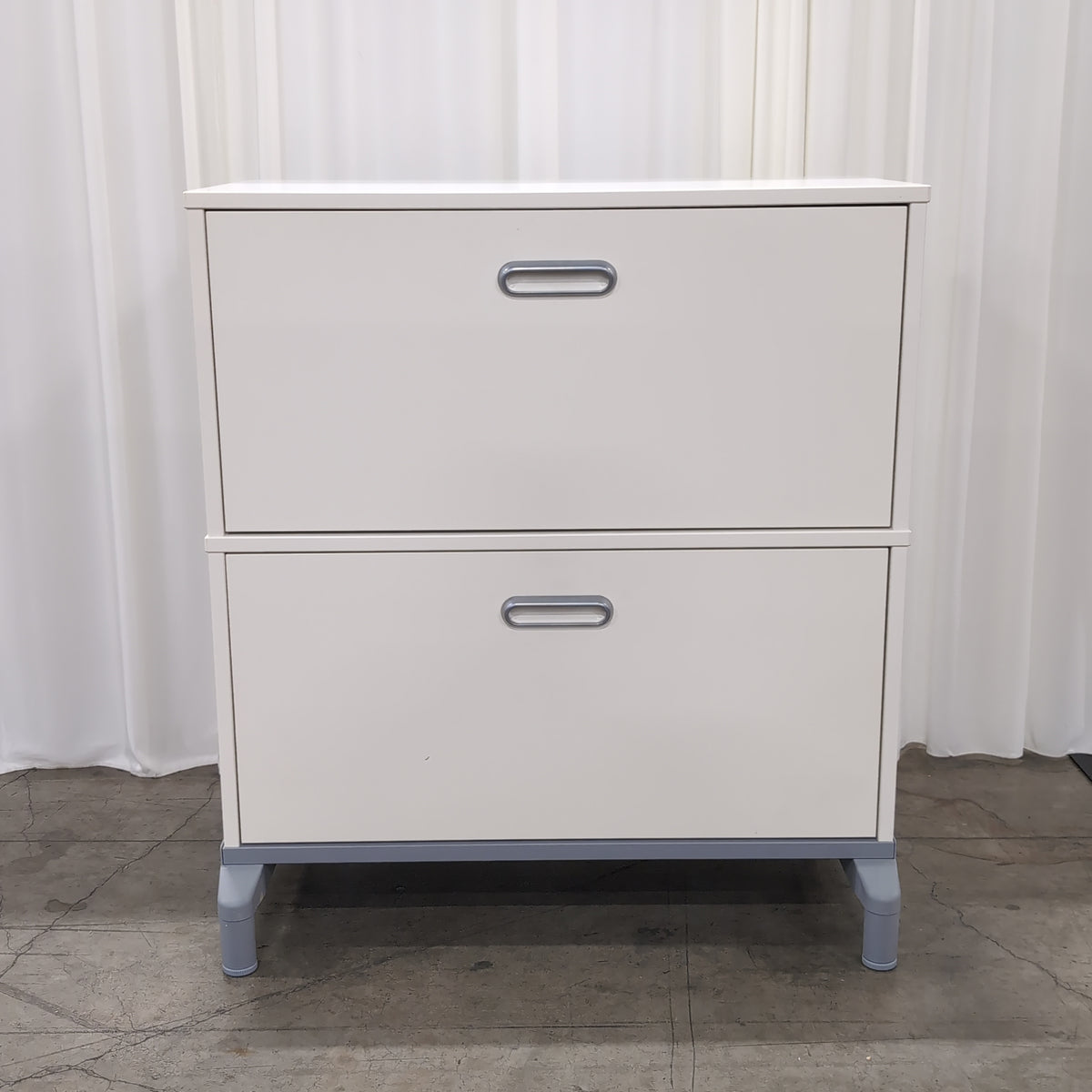 Light Gray Three-Drawer Dresser with Silver Pulls