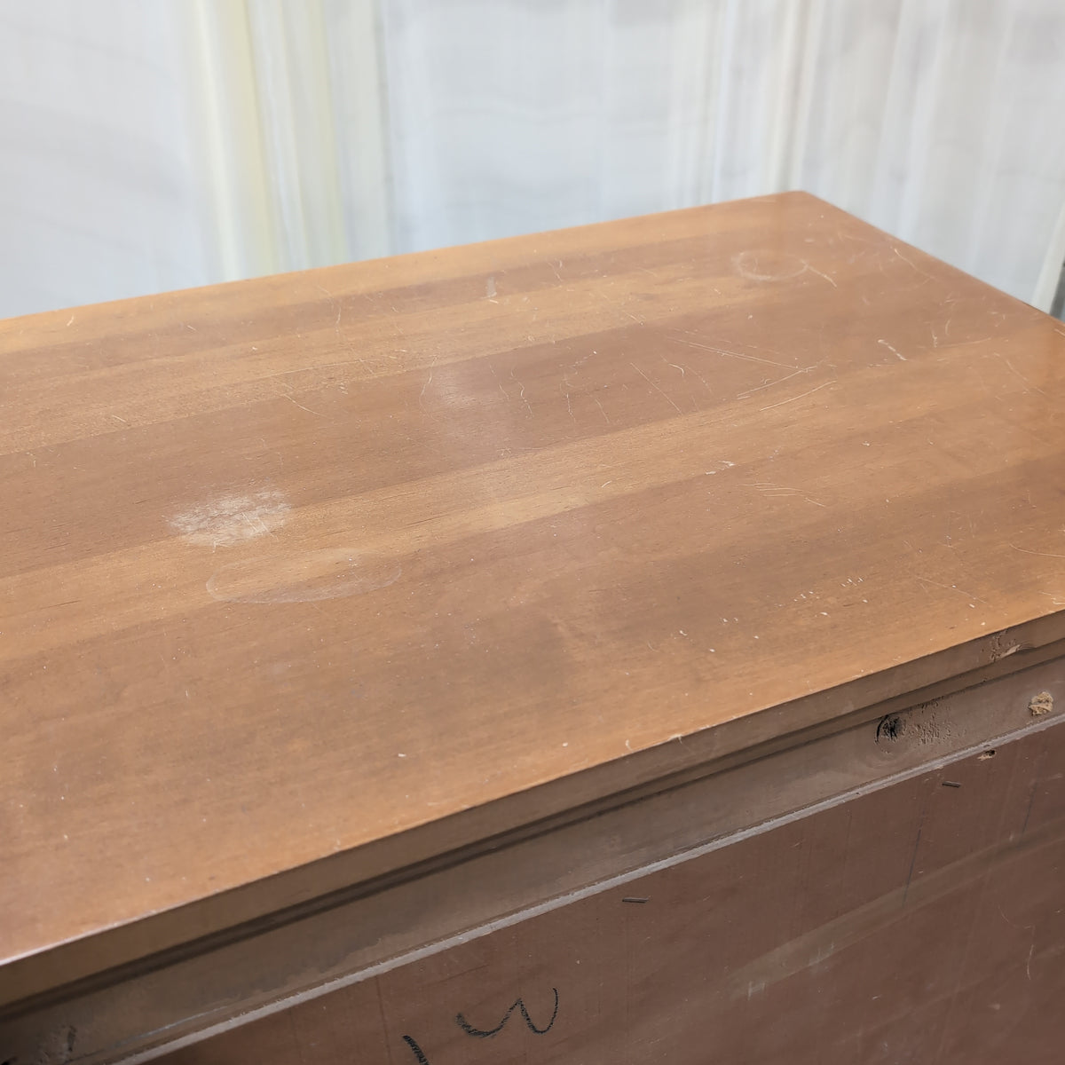 Traditional Honey Tone Nine-Drawer Dresser with Ornate Hardware
