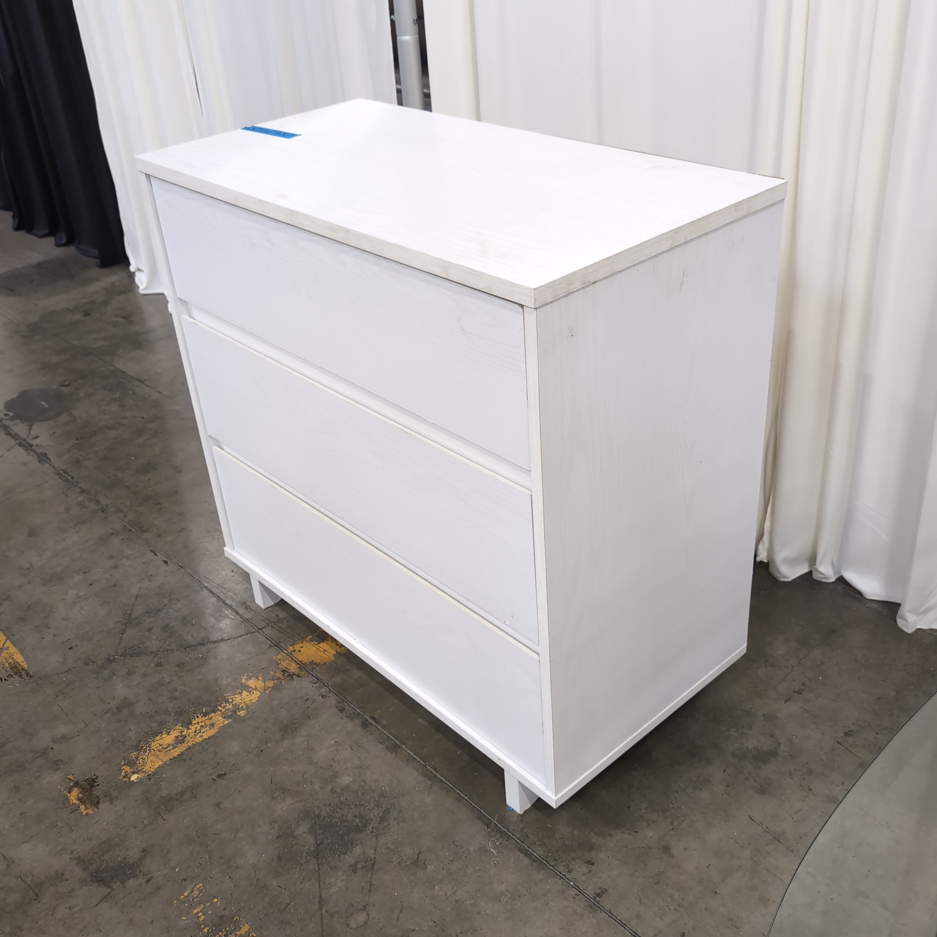 White Three-Drawer Dresser in Wood Finish