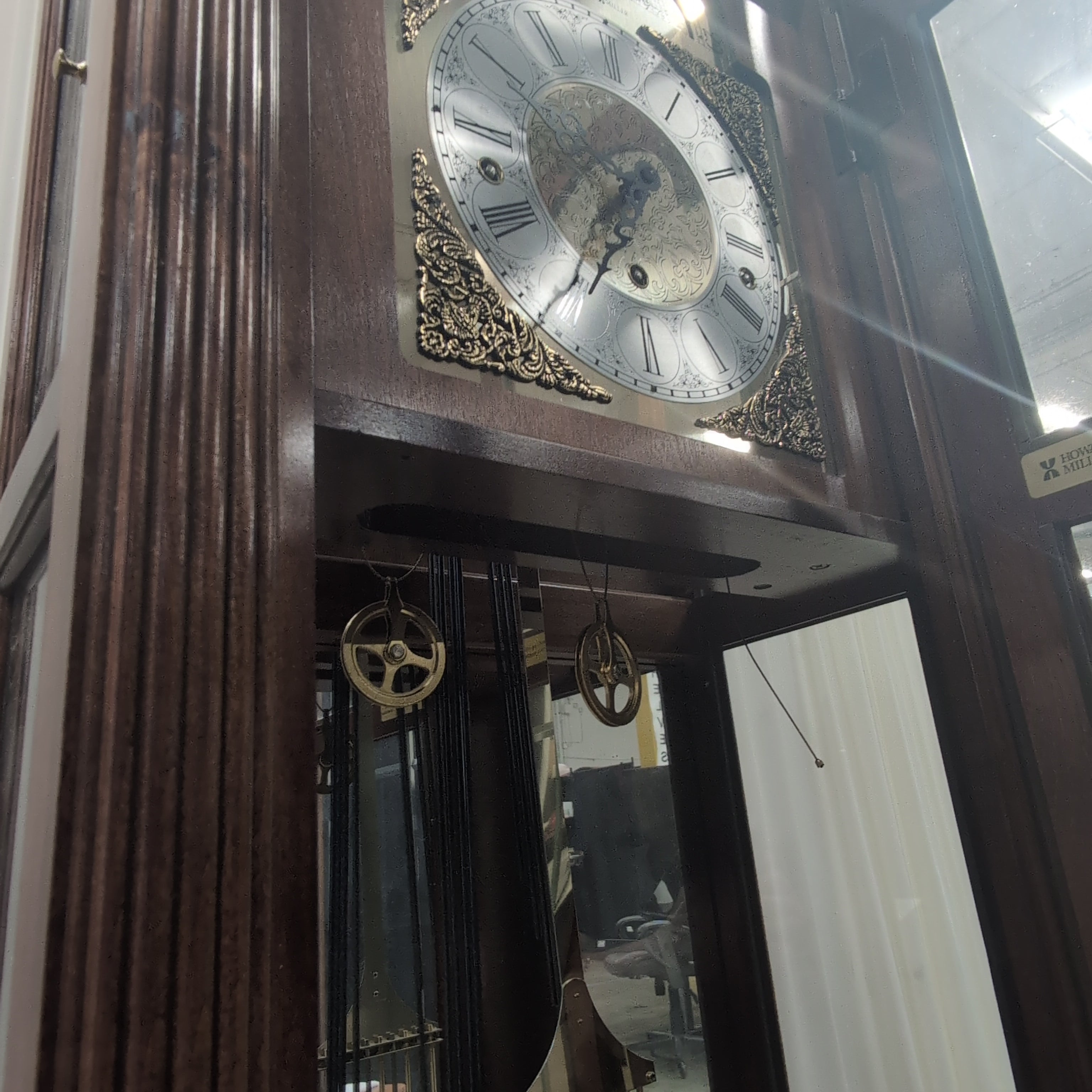 Howard Miller Decorative Wood Grandfather Clock with Brass Pendulum