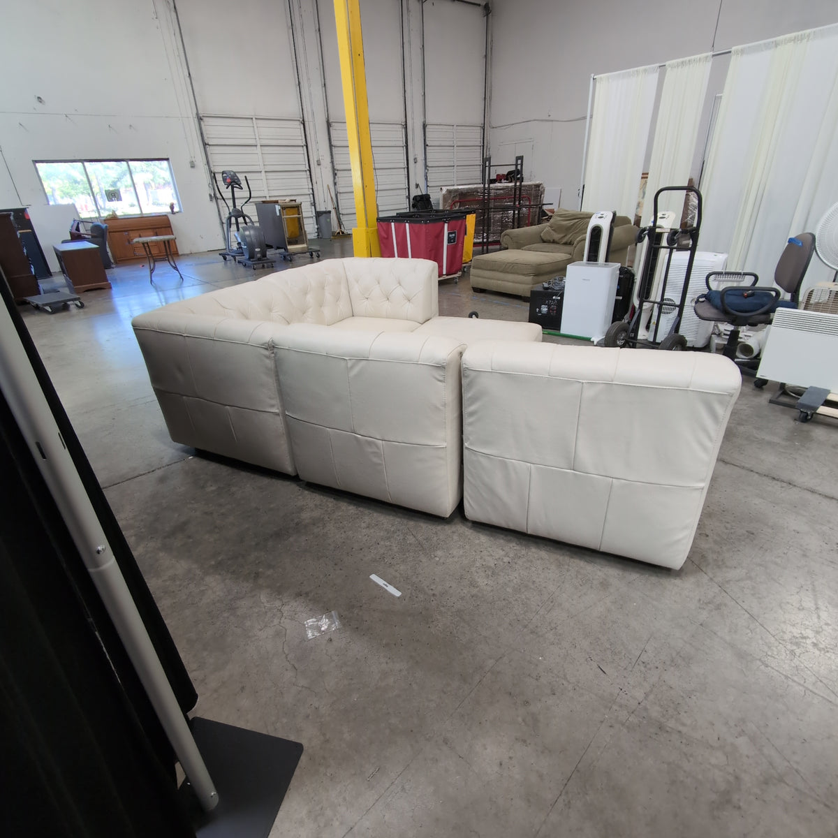 Natuzzi China Ltd. Cream Tufted L-Shaped Sectional Couch in Leather