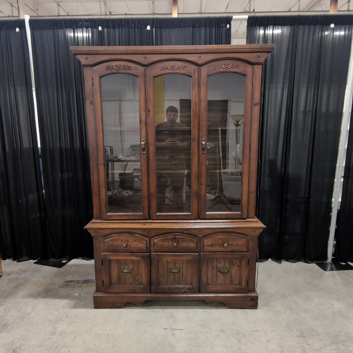 Brown Wood China Cabinet with Ornate Carvings