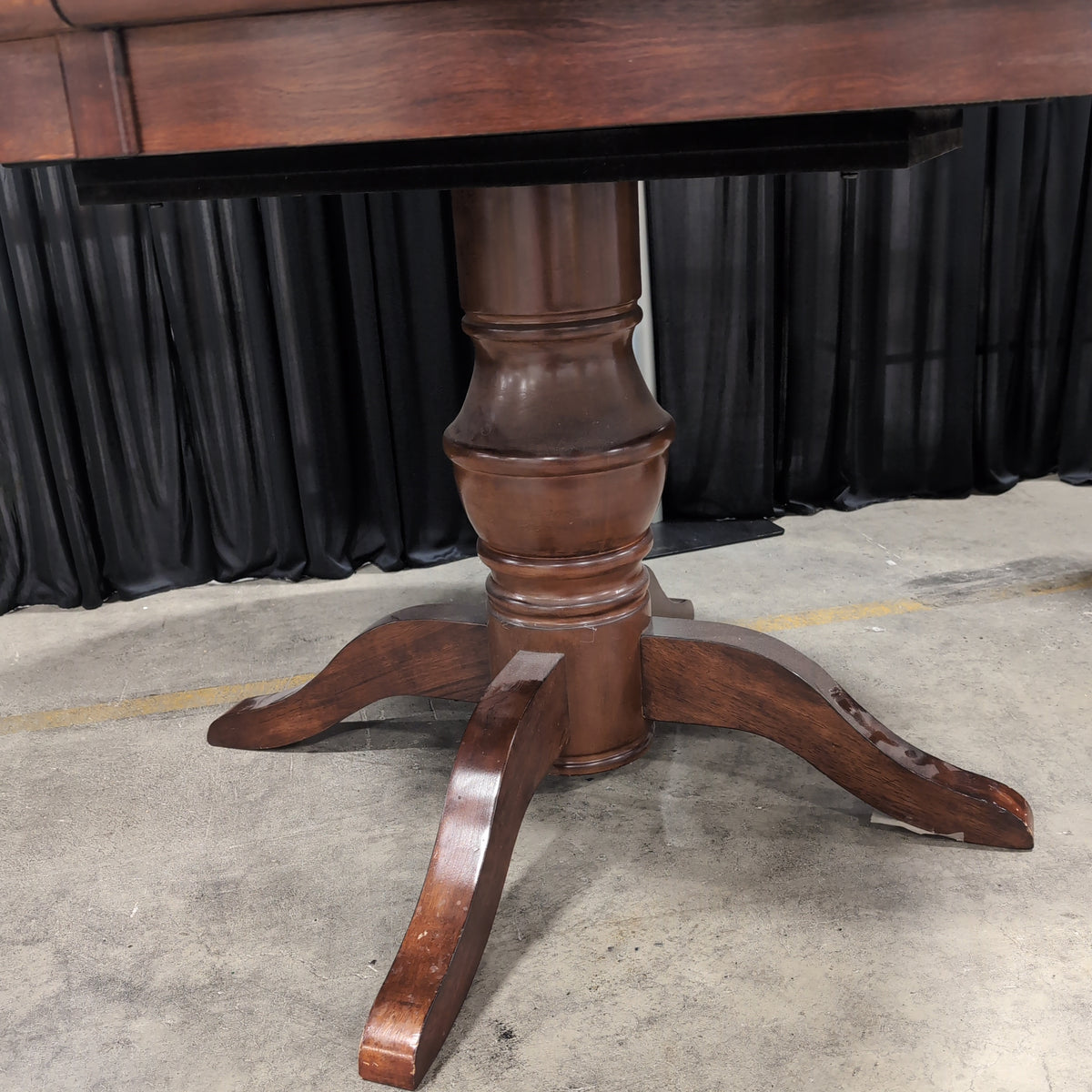 Round Dark Wood Dining Table with Pedestal Base