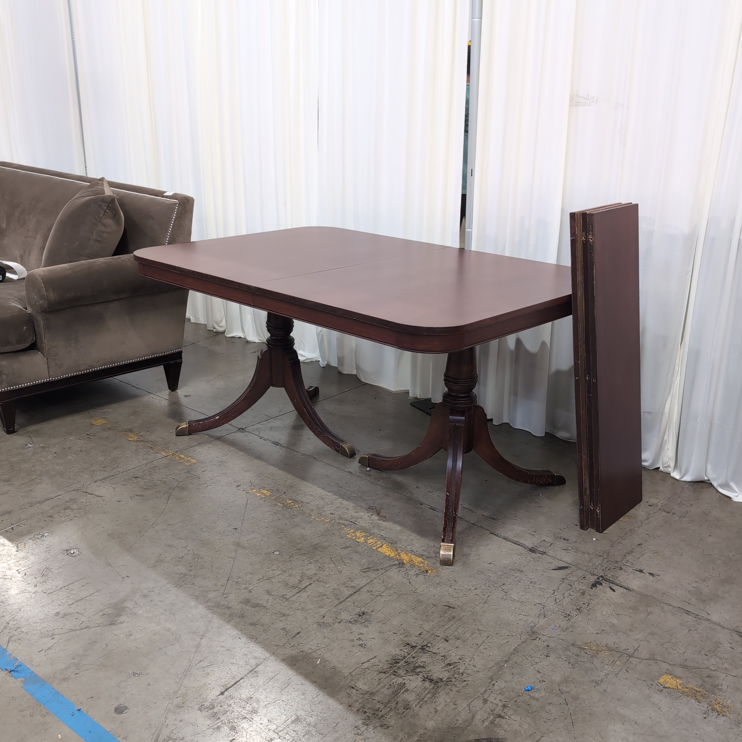 Reddish Brown Hardwood Dining Table with Rounded Corners