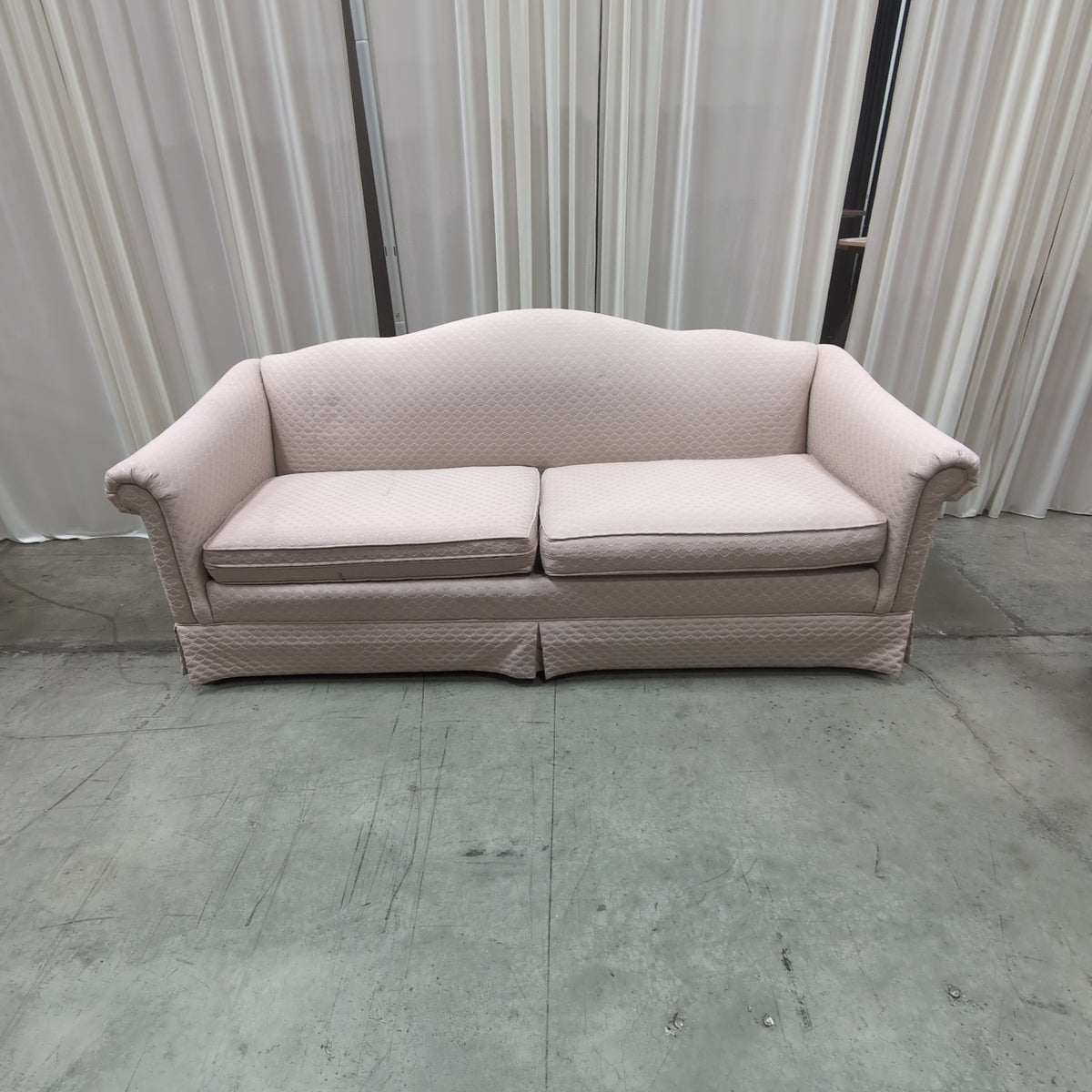 Blush Rolled Arm Couch with Skirted Base