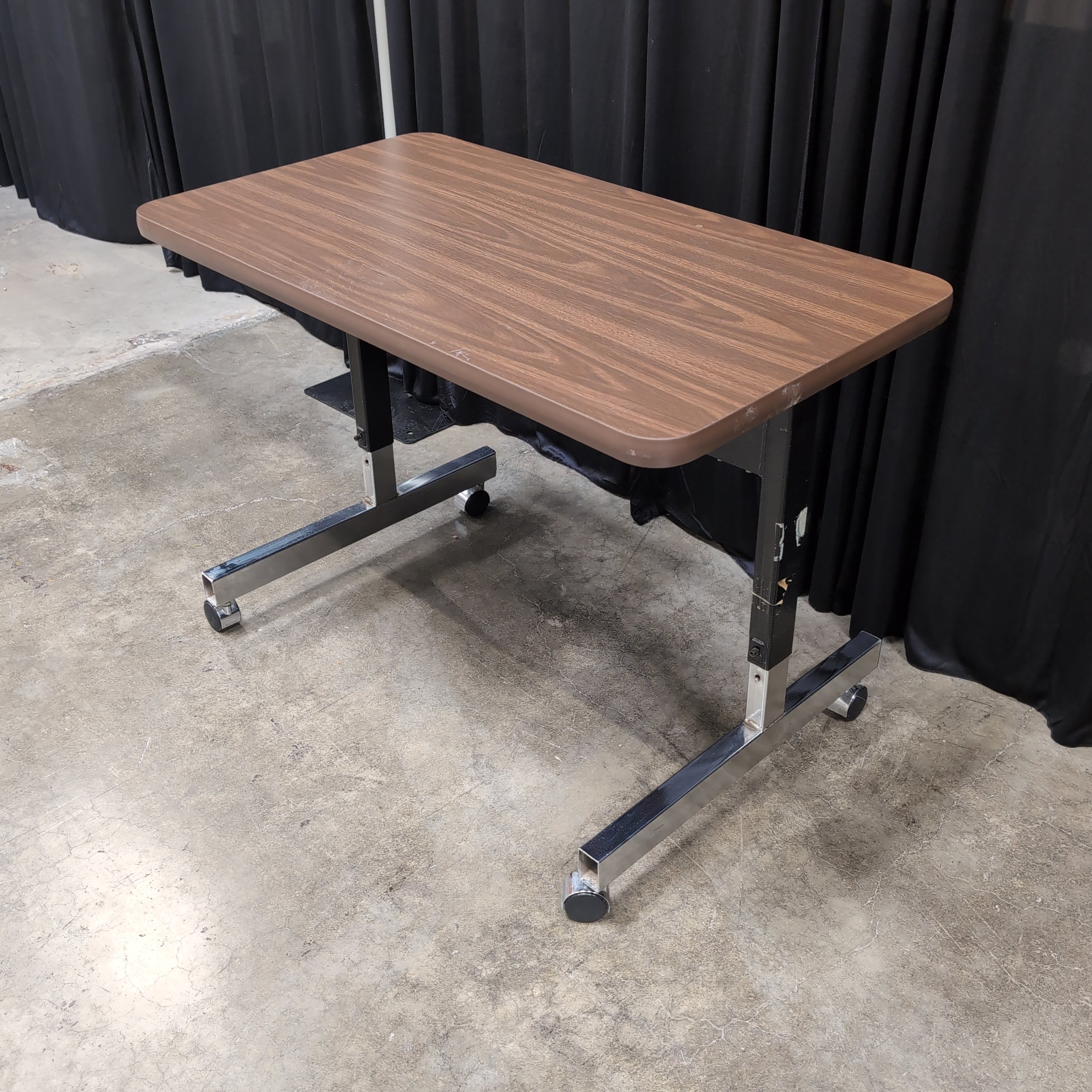 Brown Laminate Rectangular Utility Table with Casters