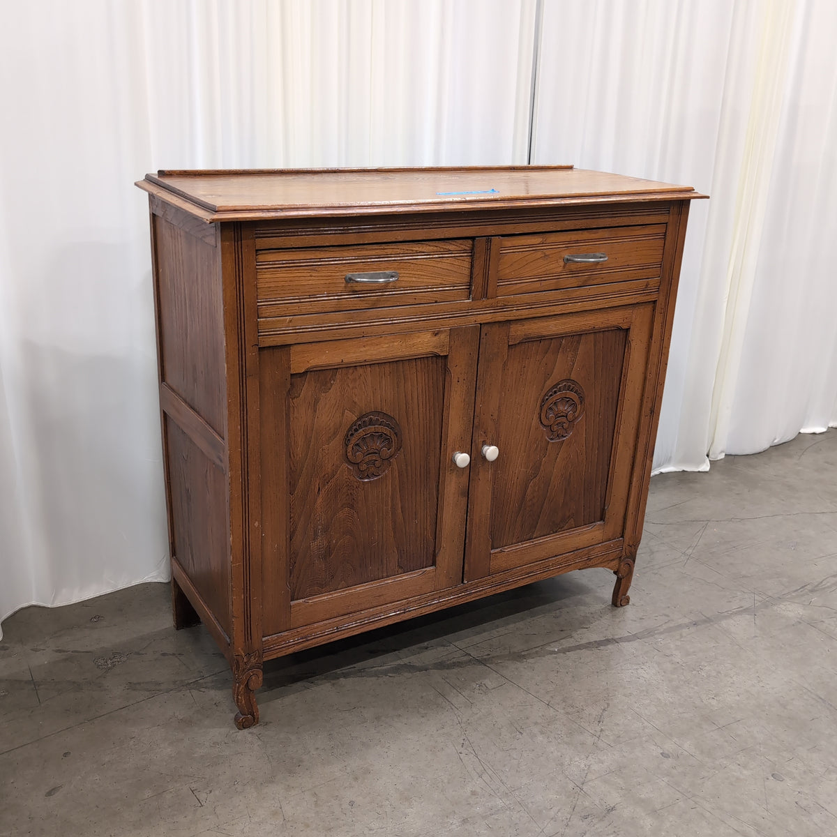 Carved Wood Two-Drawer Buffet with Cabinet Doors